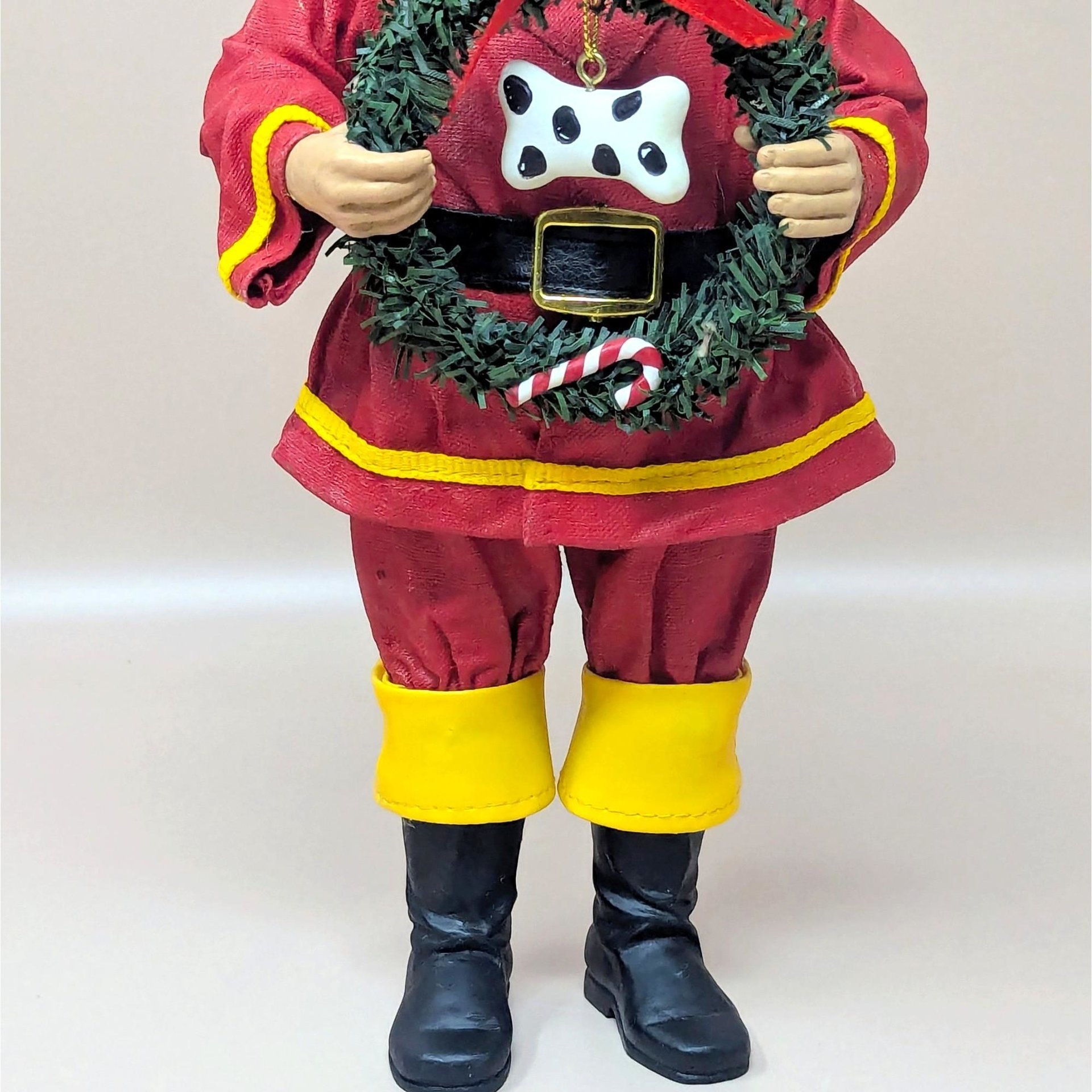 1990s Fabriche Fireman Santa Holding Wreath Figurine