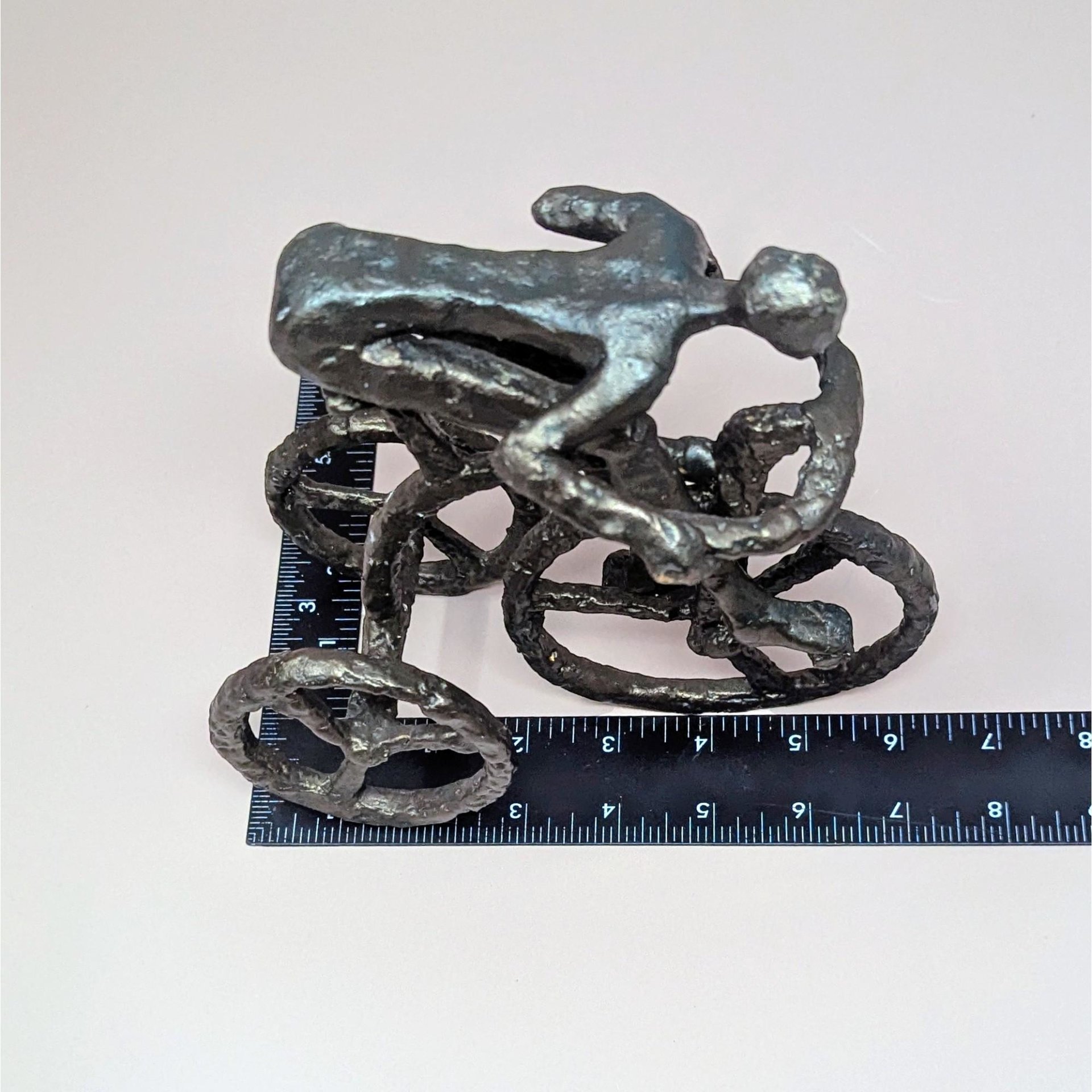 1970s Brutalist Cast Iron Man on Tricycle Sculpture