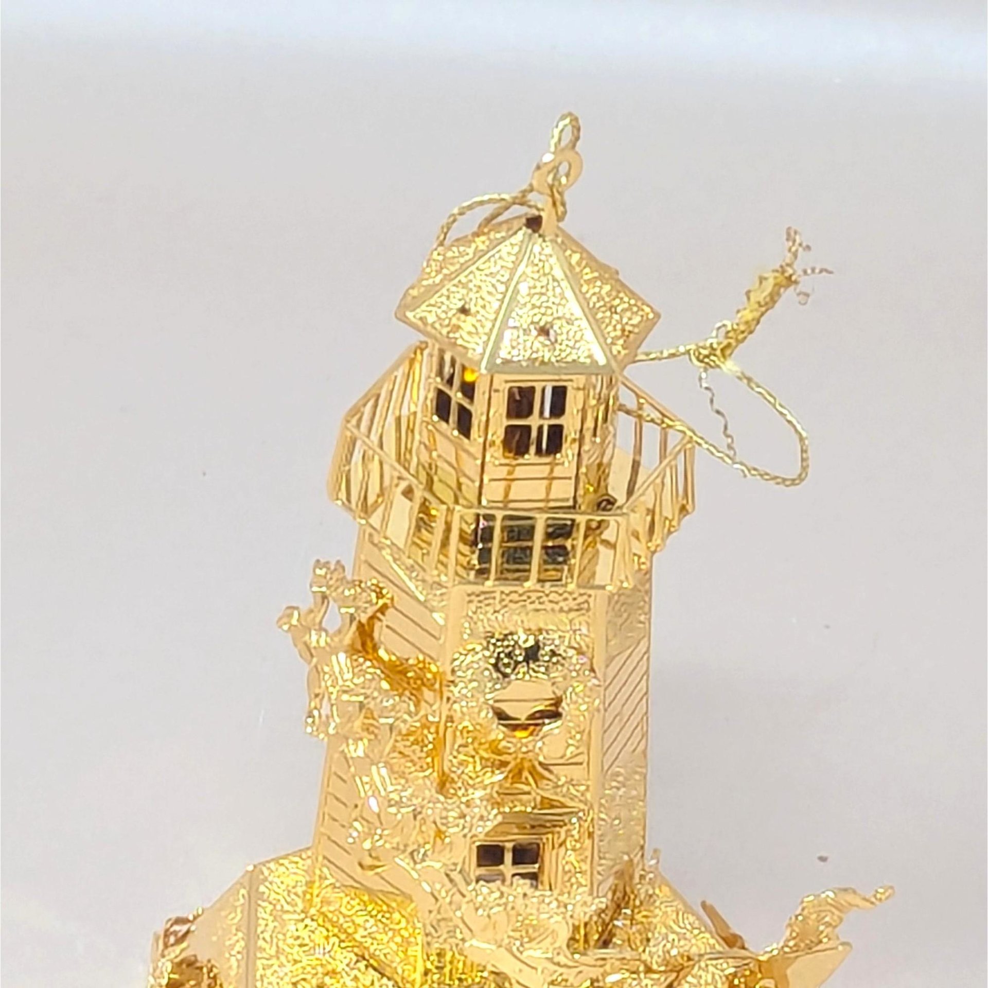 1998 Danbury Mint 23kt Gold Plated North Pole Lighthouse Ornament
