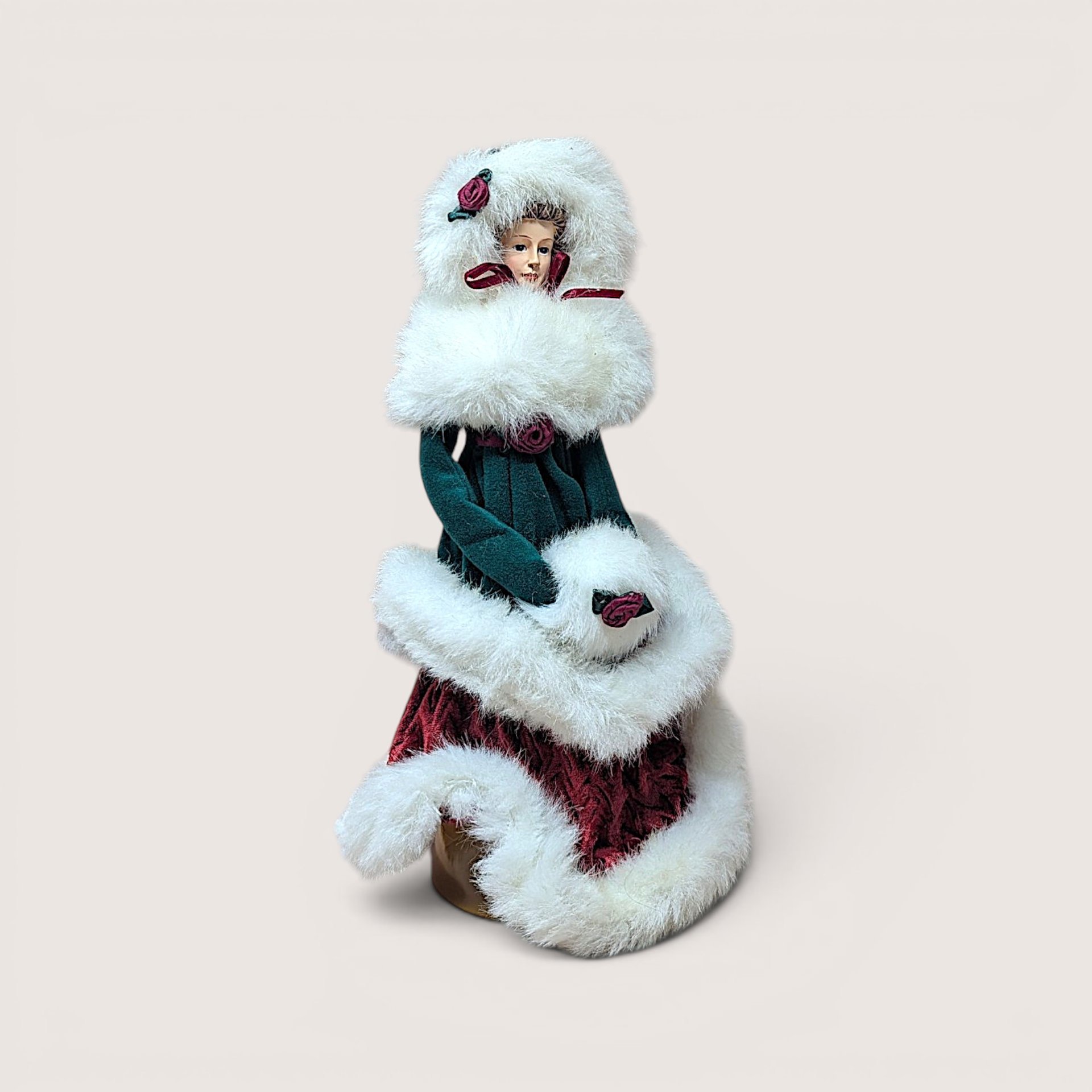 Vintage 1997 Winterthur Christmas tree topper doll in green and burgundy velvet with white faux fur trim.