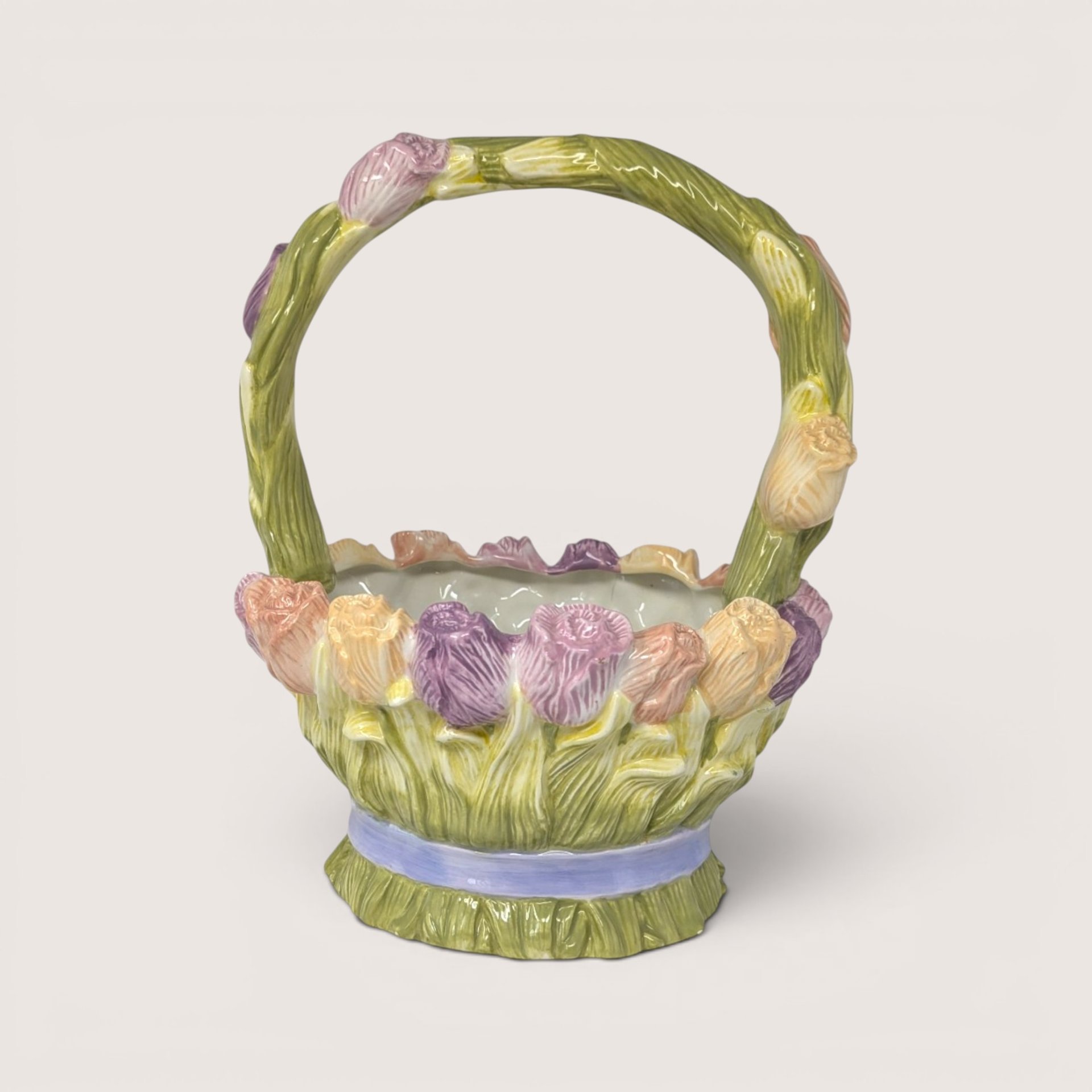 Vintage Silvestri ceramic basket planter with pastel sculpted tulips, butterfly, and blue ribbon.