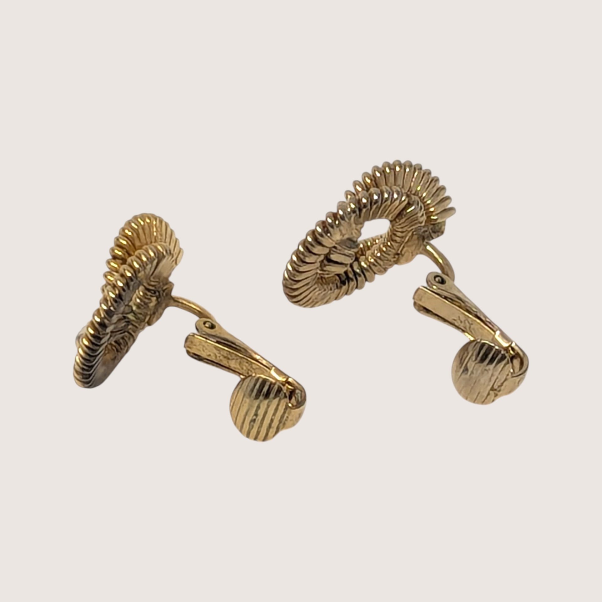 1980s Textured Gold Tone Swirl Clip On Earrings