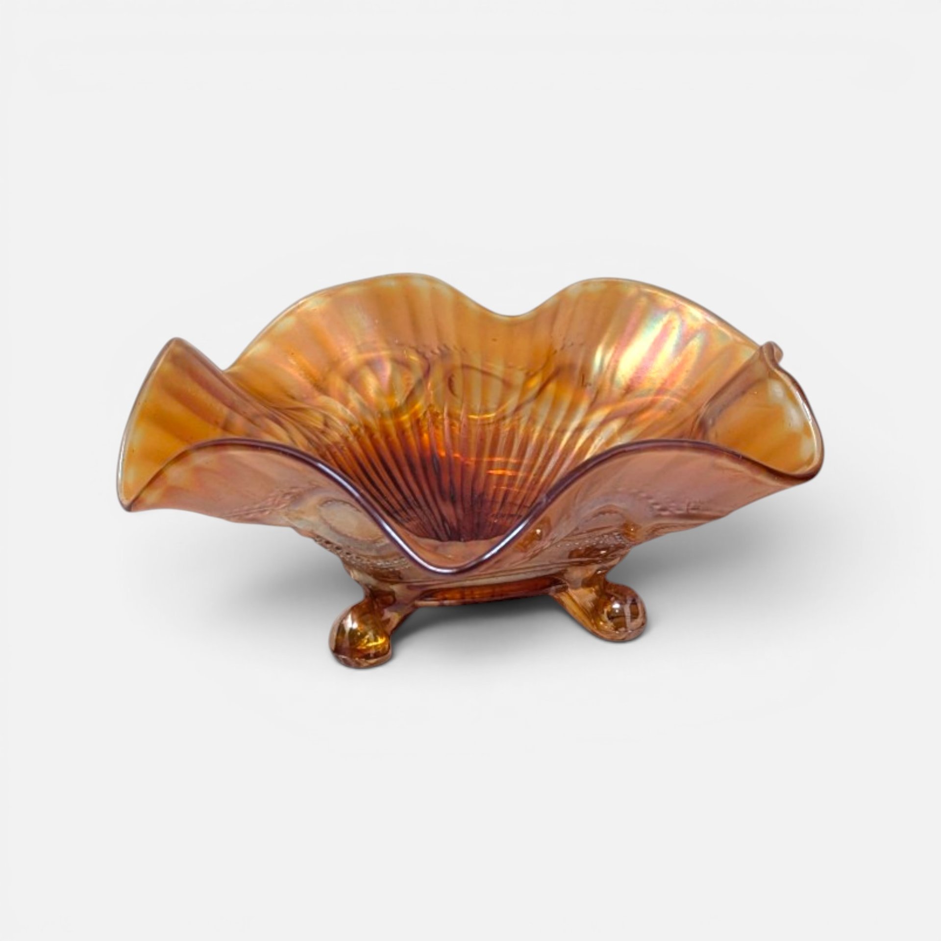 Antique 1910s Northwood marigold carnival glass footed bowl with wide ruffled rim and iridescent finish.