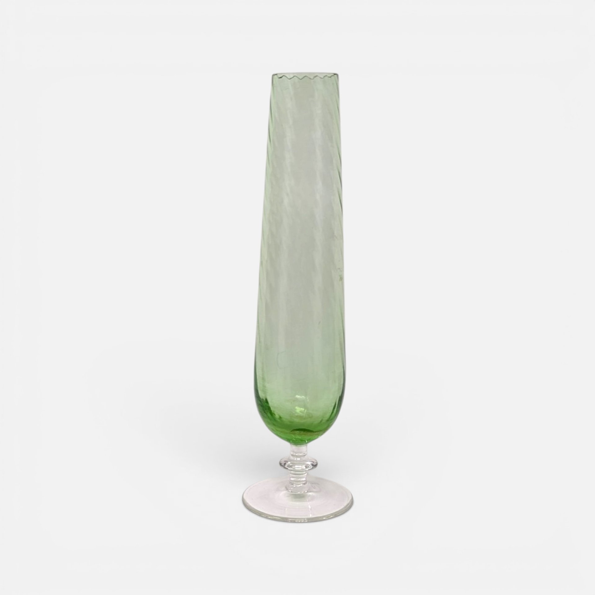 Vintage light green optic swirl glass stemmed bud vase with clear footed pedestal base and scalloped rim