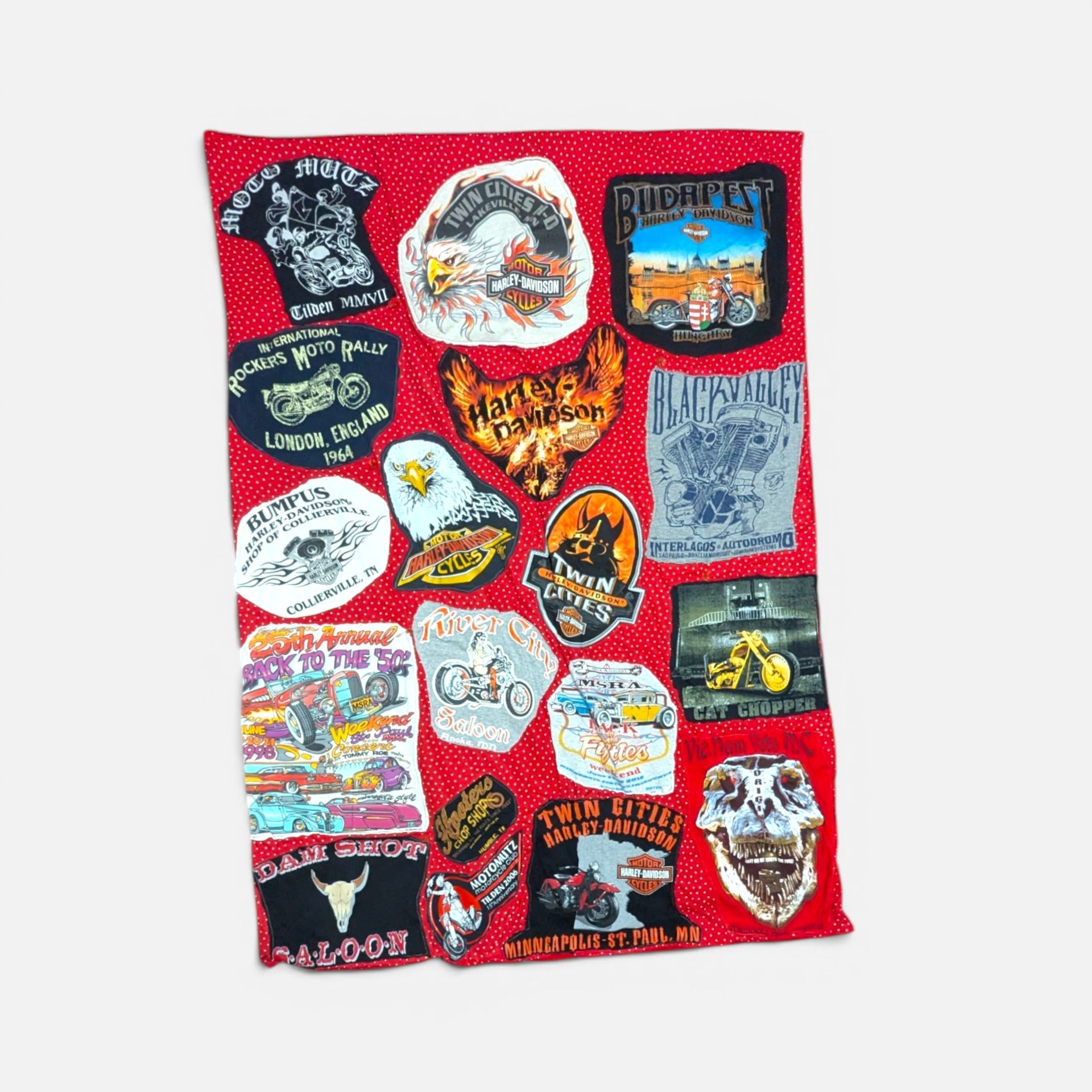 Handmade Harley Davidson t-shirt throw blanket featuring various motorcycle rally graphics on red polka-dot fabric.