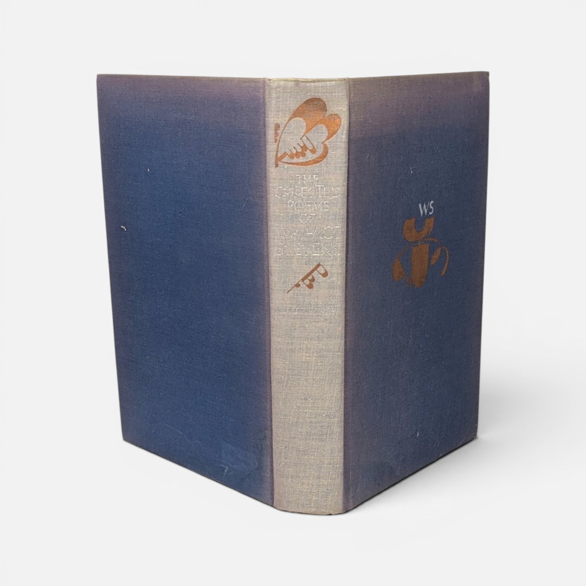 Vintage 1965 hardcover The Collected Poems of Wallace Stevens published by Alfred A. Knopf on a plain background.