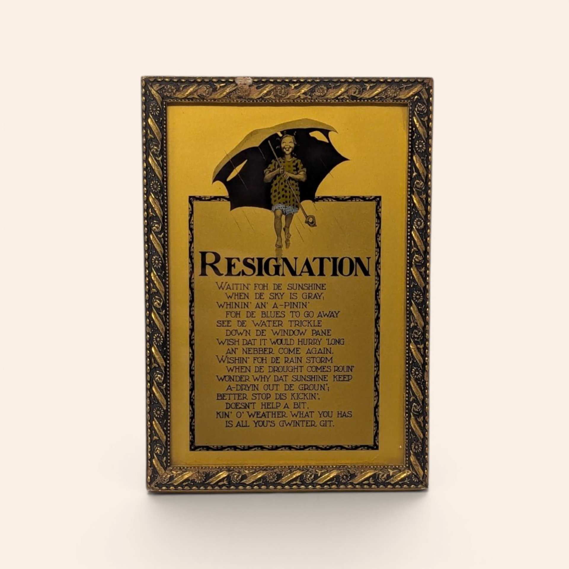 Vintage framed Resignation poem art on a gold-tone background with an umbrella illustration.