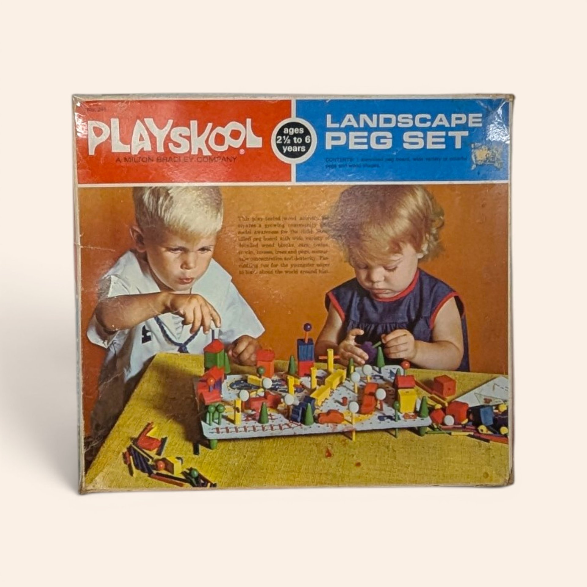 Vintage Playskool Landscape Peg Set box featuring mid-century children playing with wooden blocks.