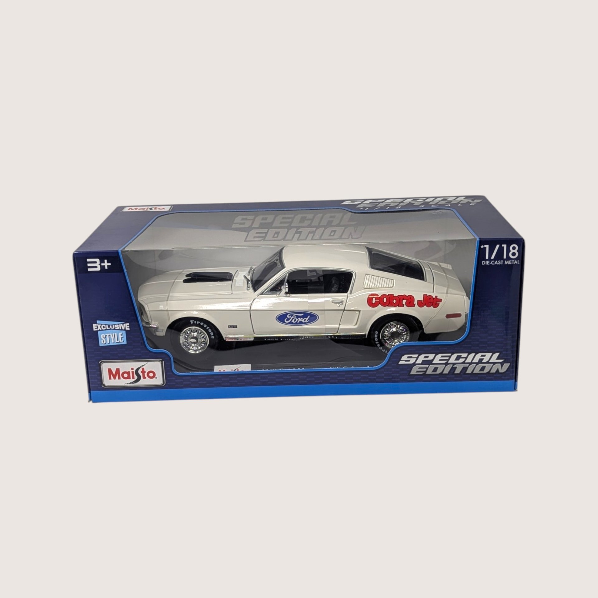 Maisto white and red 1968 Ford Mustang GT Cobra Jet die-cast vehicle in its original window box set against a plain linen background.