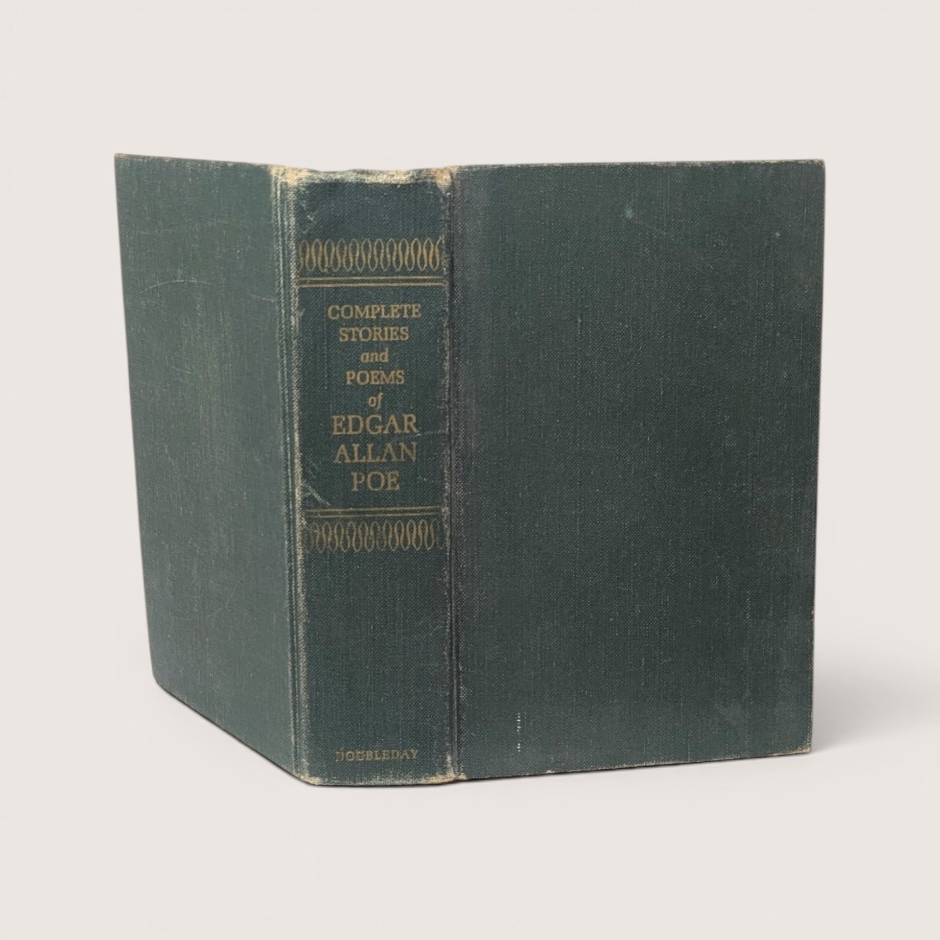 Vintage 1966 green hardcover copy of Complete Stories and Poems of Edgar Allan Poe by Doubleday