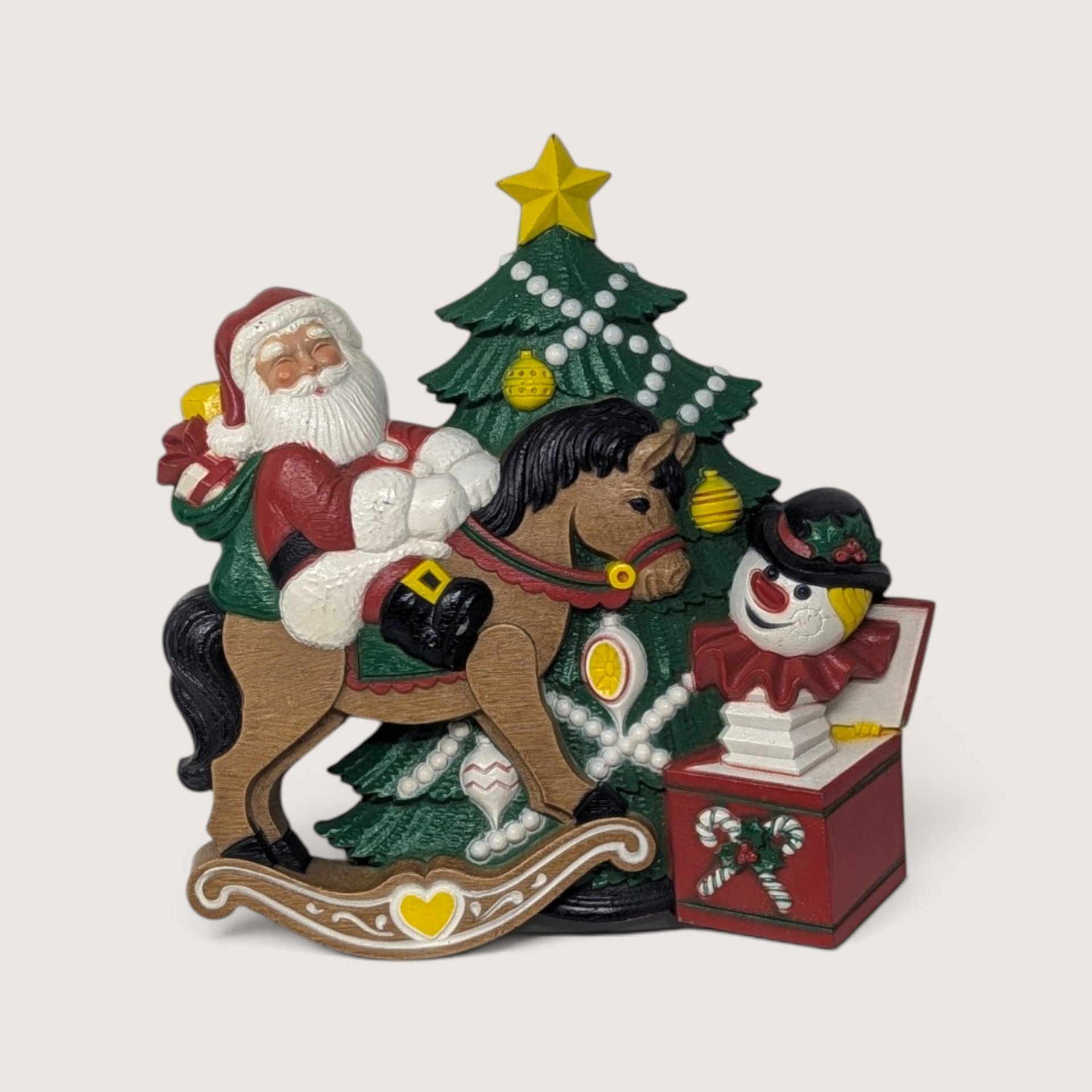 Vintage 1990 Burwood plastic Christmas wall hanging with Santa and toys.