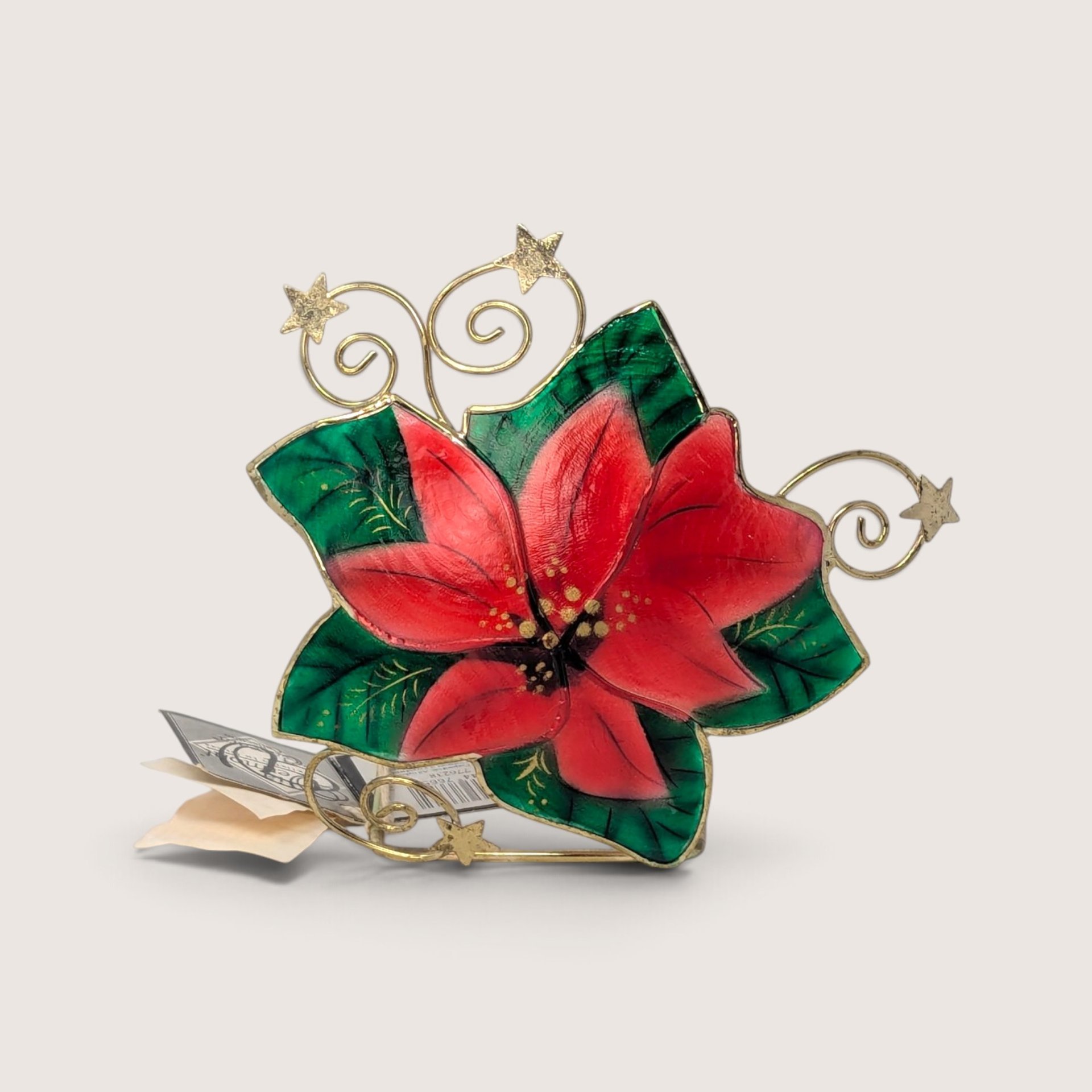 Vintage 1999 Enesco red and green poinsettia candle holder crafted from natural shell and wire-form metal with star accents.