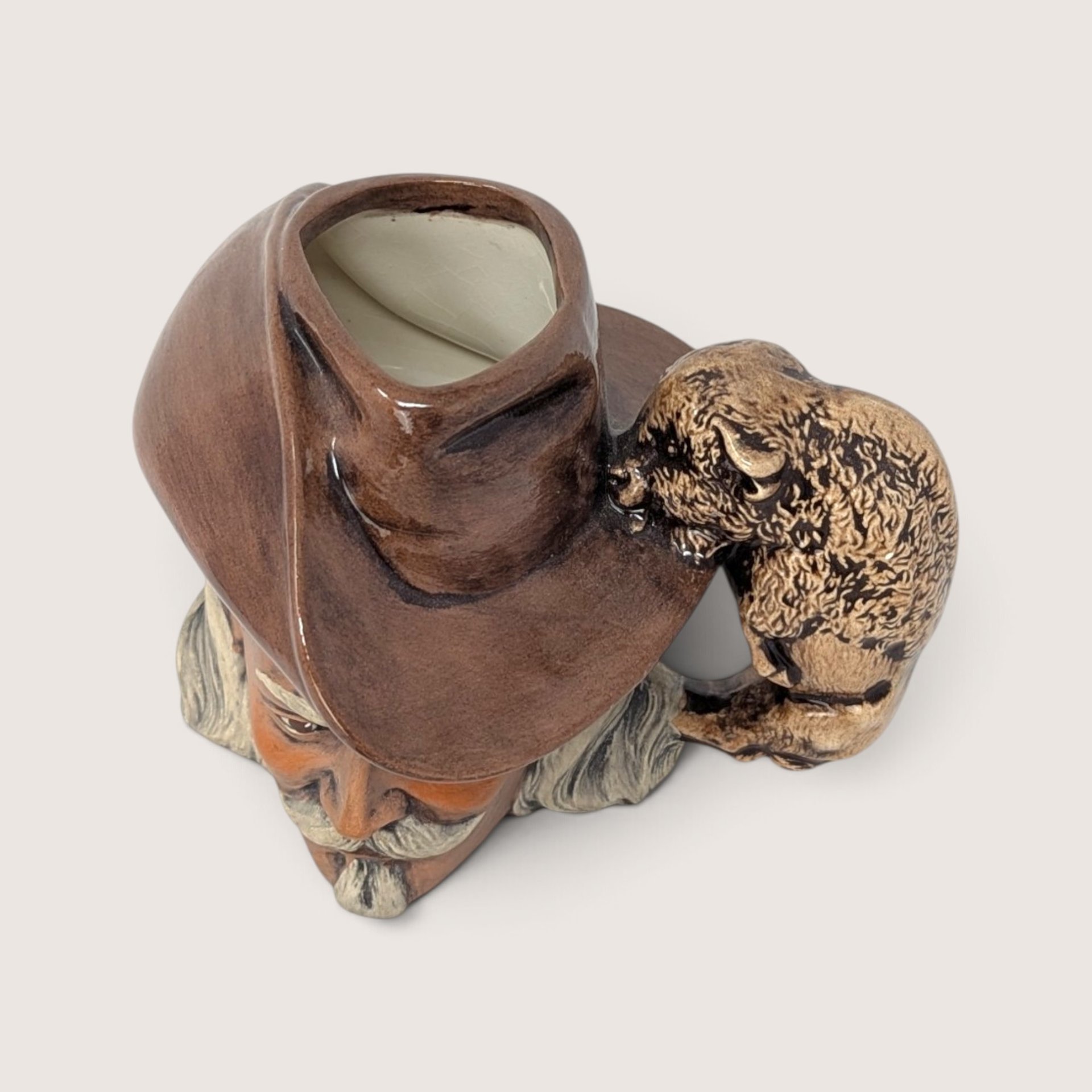 Vintage hand-painted ceramic character mug depicting Buffalo Bill Cody with a sculpted bison handle and "DAD" inscribed on the base.