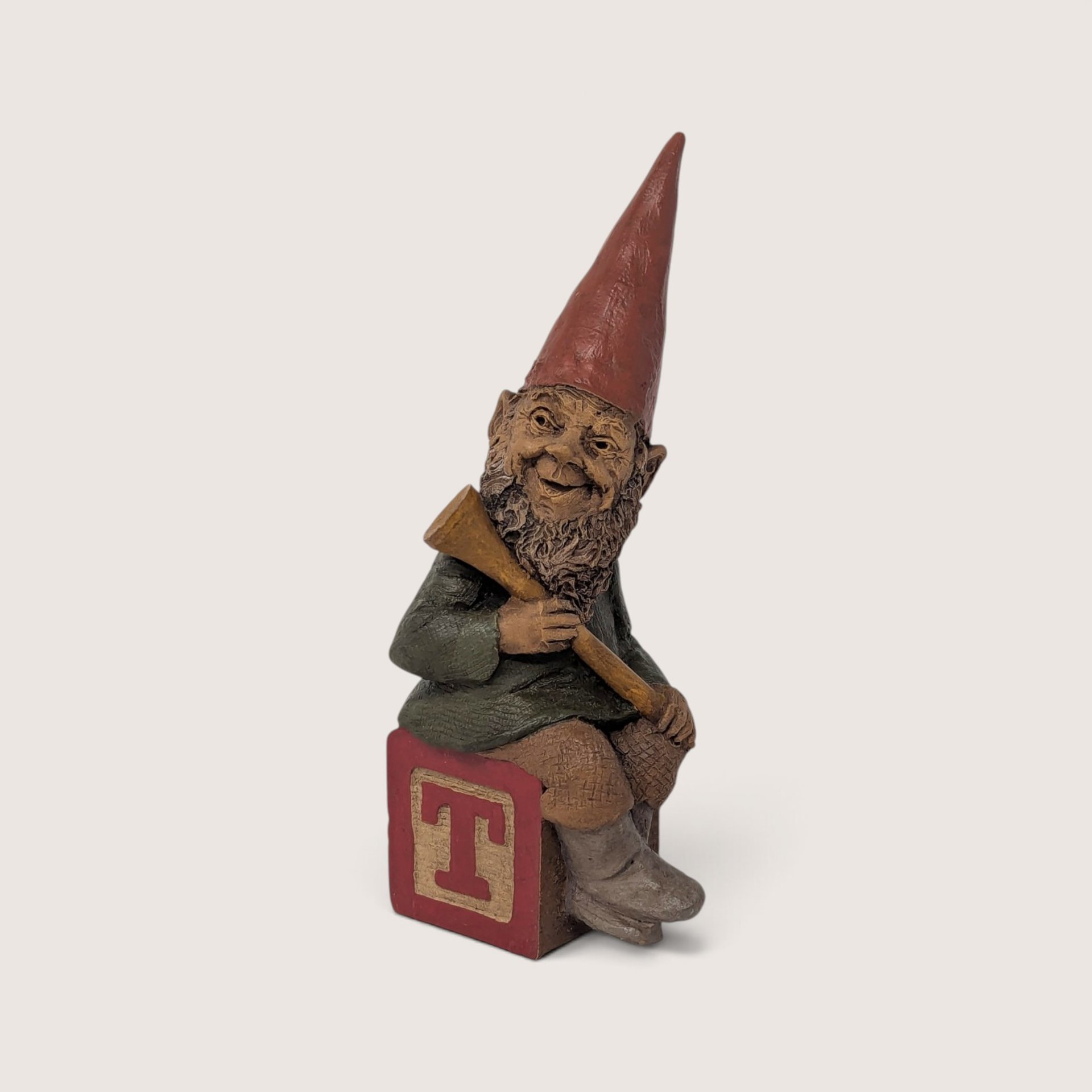 Vintage 1989 Tom Clark signed gnome figurine sitting on a red alphabet block with the letter T.
