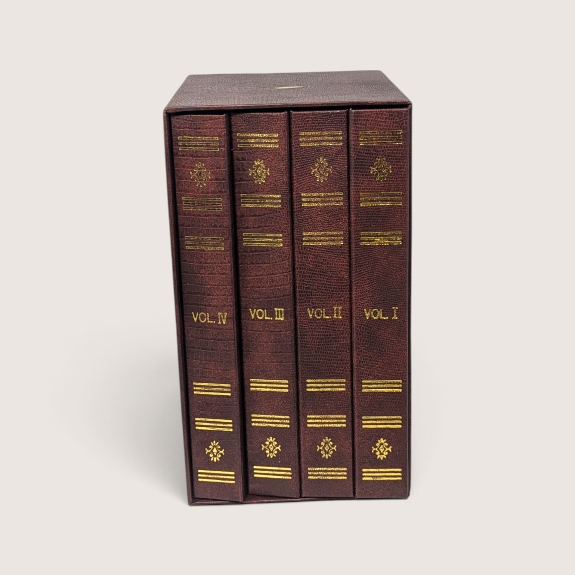 Vintage faux leather bound photo book case set with four volumes styled like antique books in a slipcase box.