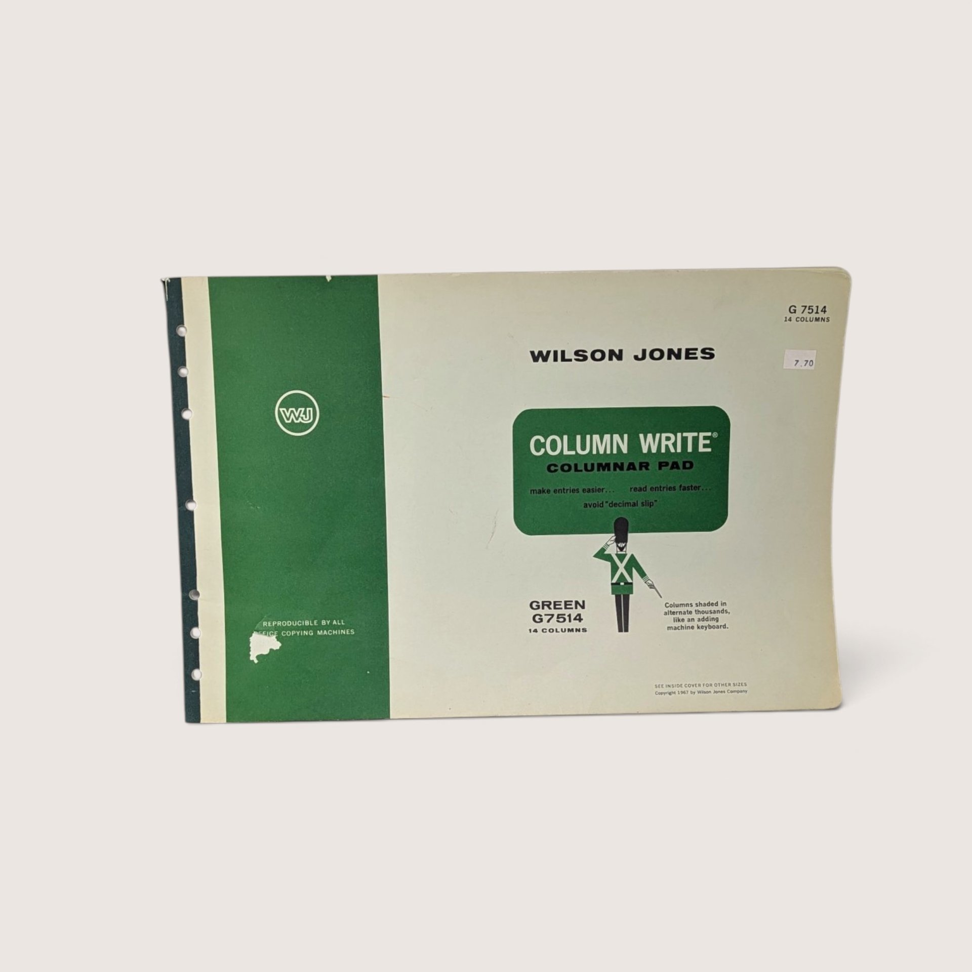 A vintage Wilson Jones Column Write G7514 columnar pad featuring a green and white cover with a guardsman graphic and copyright date of 1967 against a neutral background.