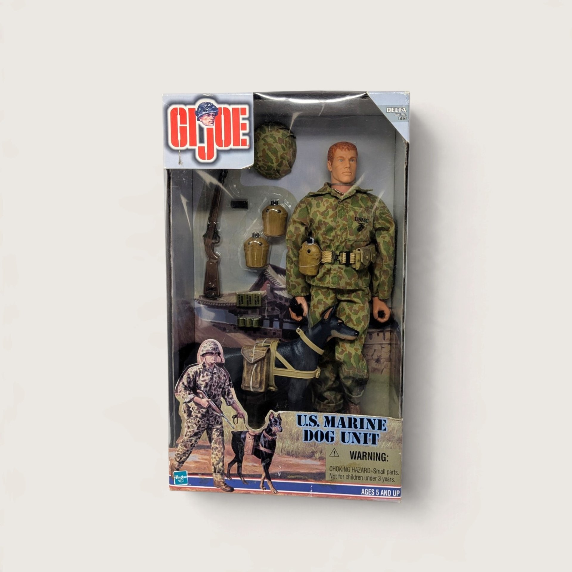 Vintage 1999 Hasbro GI Joe US Marine Dog Unit 12-inch action figure and dog packaged in original retail box on white backdrop.   