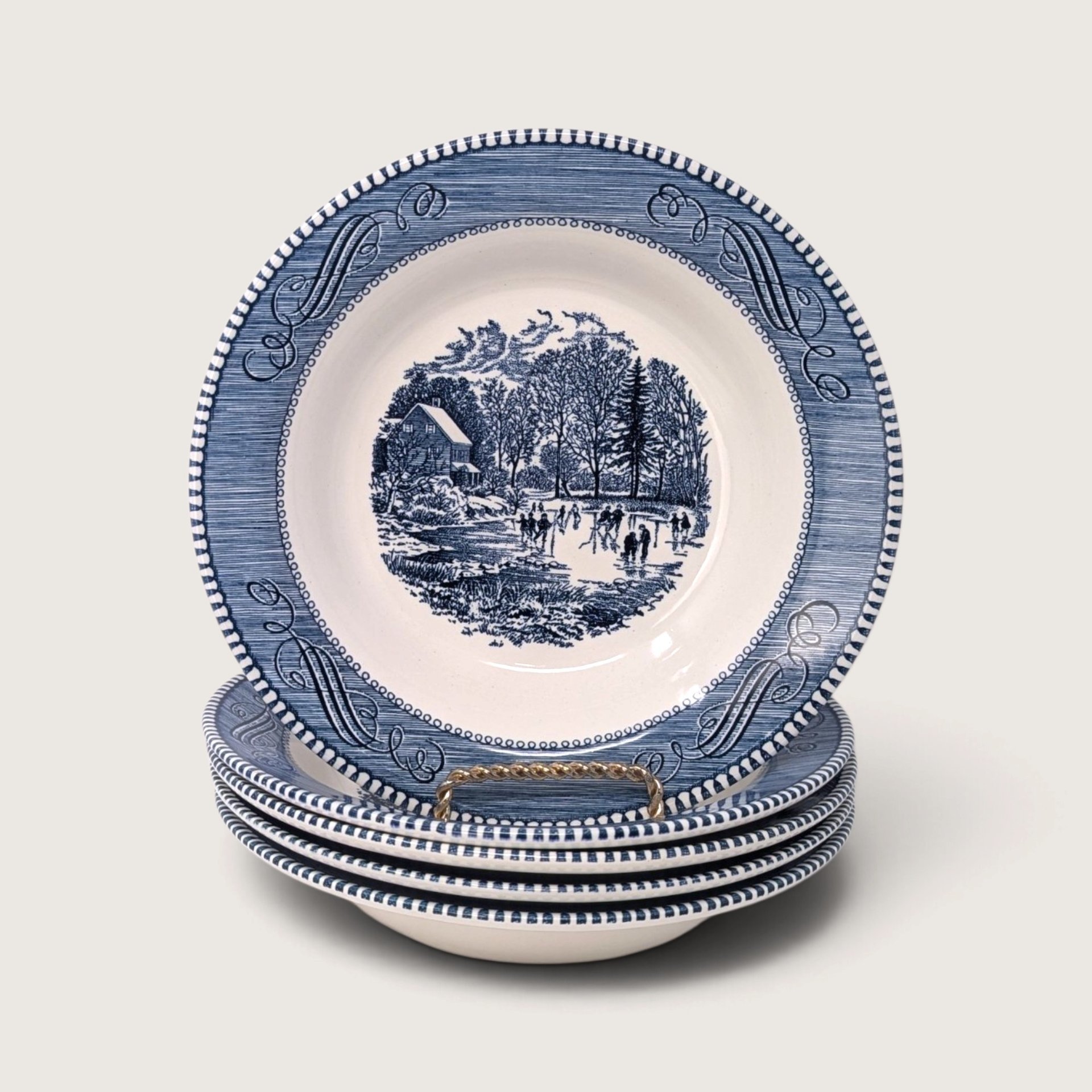 Vintage set of five Royal Currier and Ives blue and white transferware bowls featuring an Early Winter ice skating pond scene.   