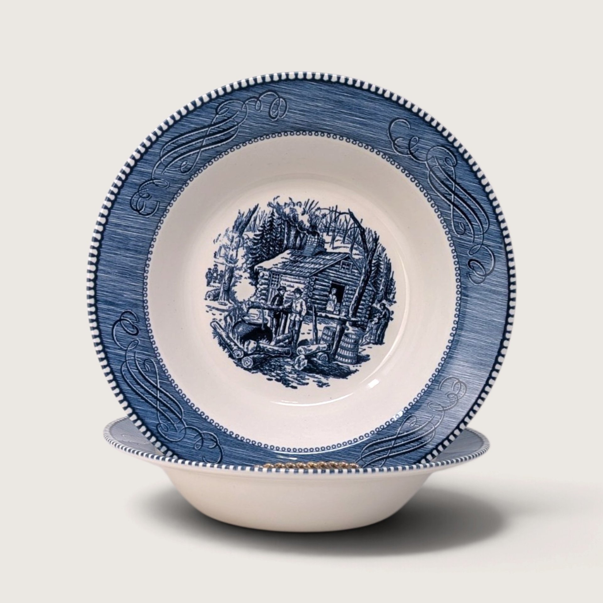 Vintage pair of Royal Currier and Ives blue and white transferware serving bowls featuring the Maple Sugaring scene.   