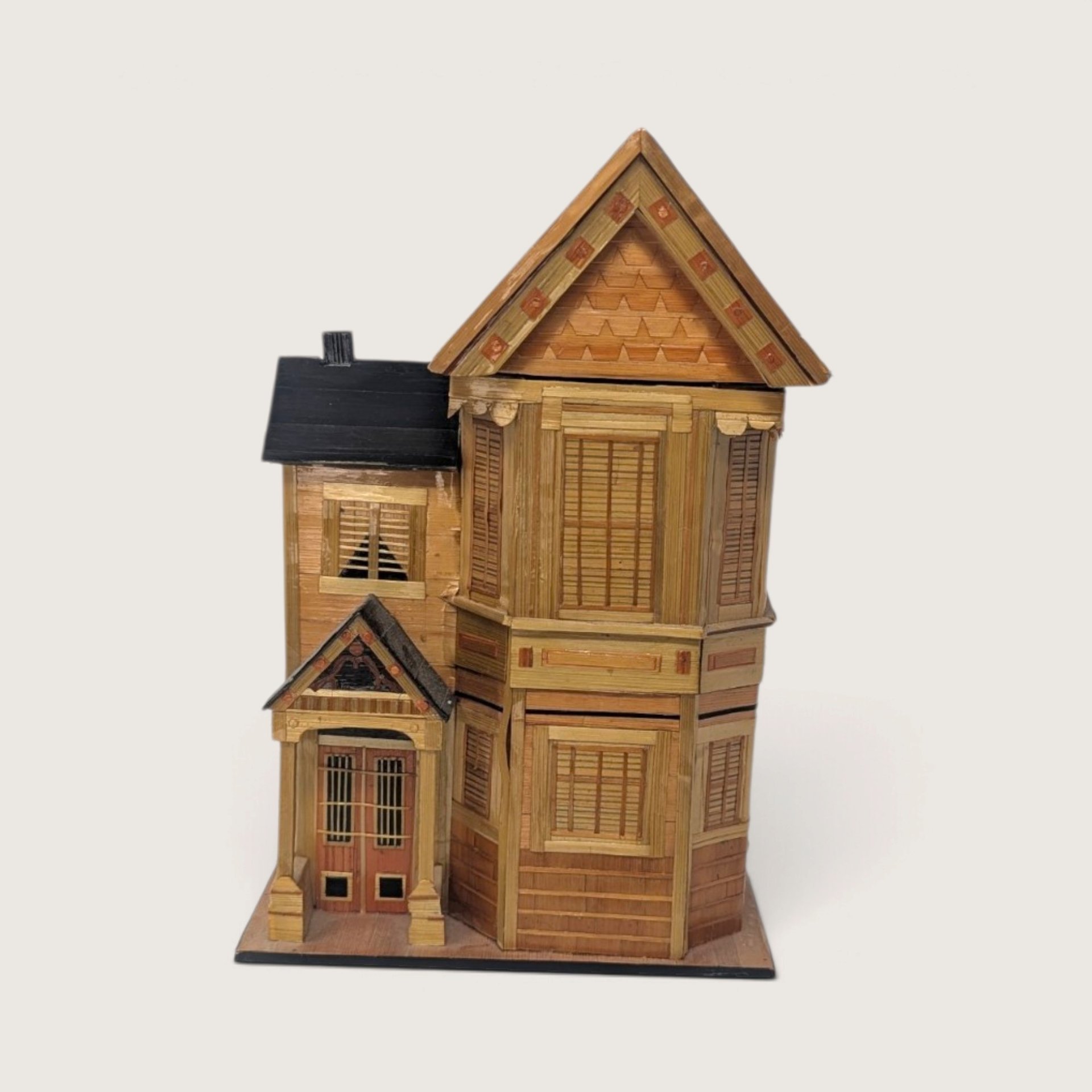 Vintage handcrafted straw marquetry wooden trinket box shaped like a peaked roof Victorian house with gables and porch.   