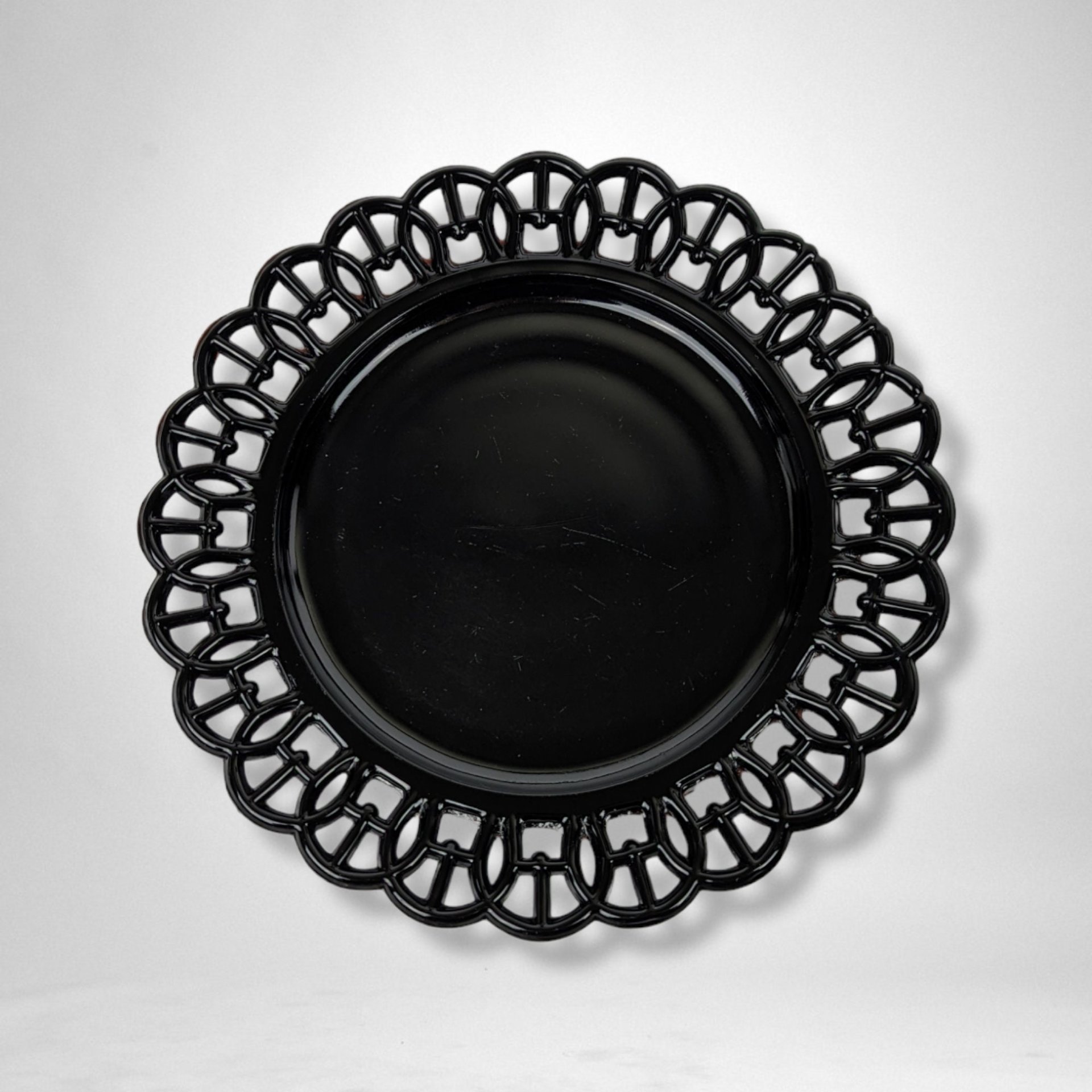 Pair of Black Atterbury & Co Wicket Border Black Glass Plates