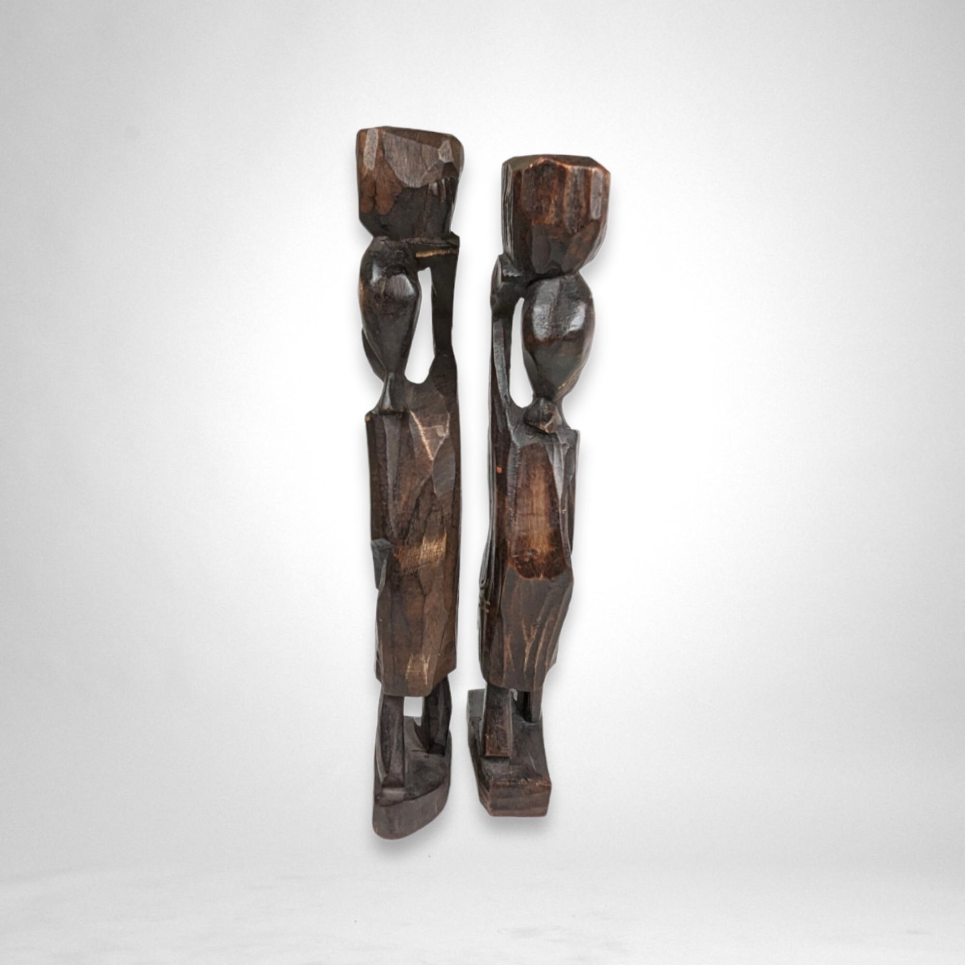 Pair of Vintage Hand-Carved African Wooden Sculptures: Exquisite Artistry and Cultural Beauty