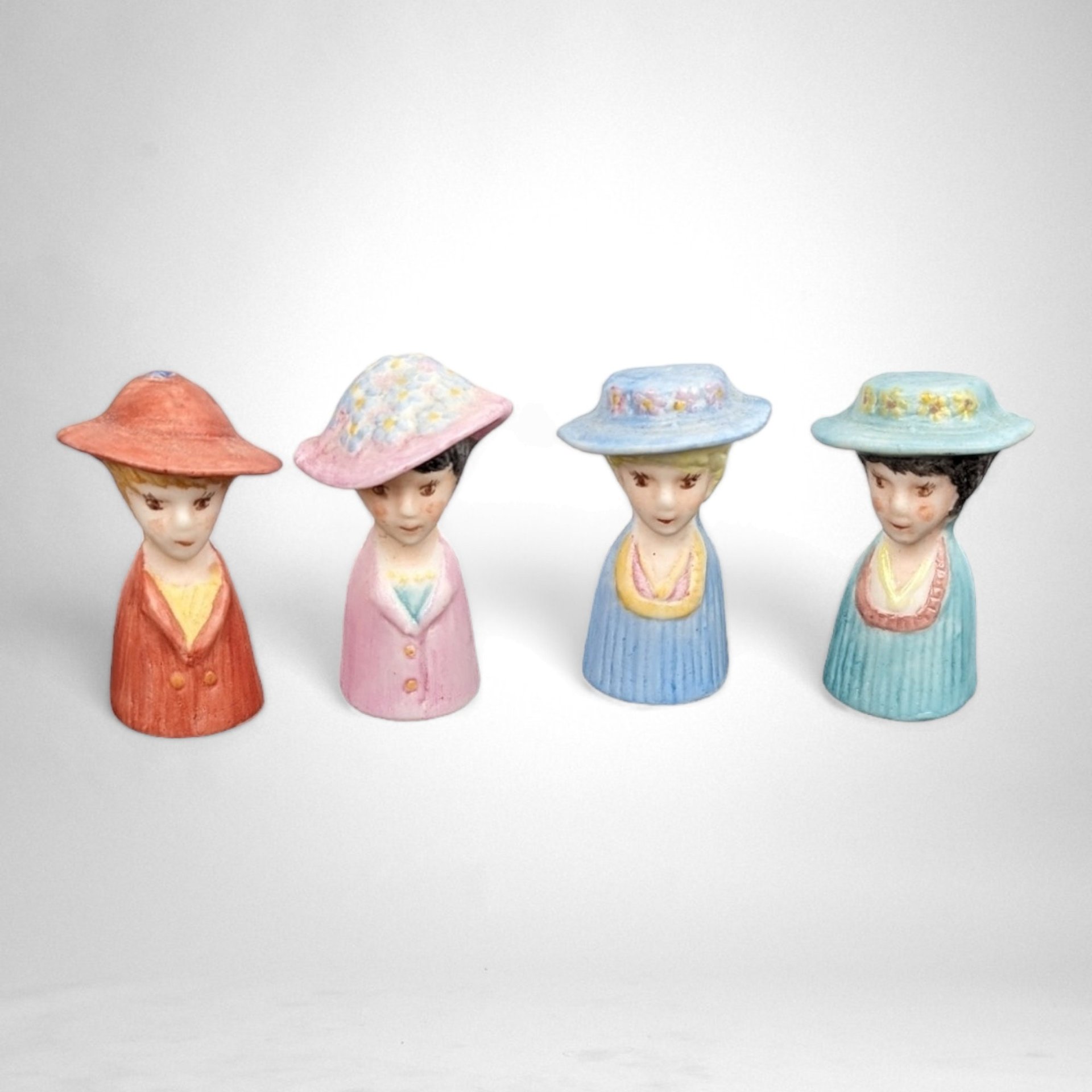 Set of 4 Ceramic Lady Head Thimble Figurines: Delicate Collectibles