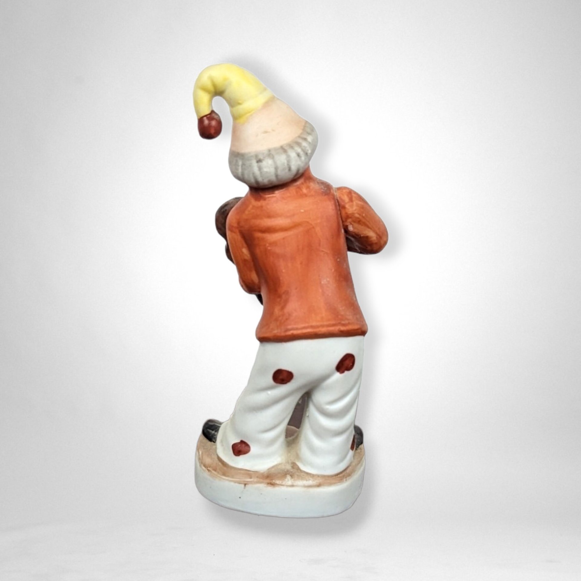 Whimsical Nostalgia: Vintage Ceramic Violin Clown Figurine