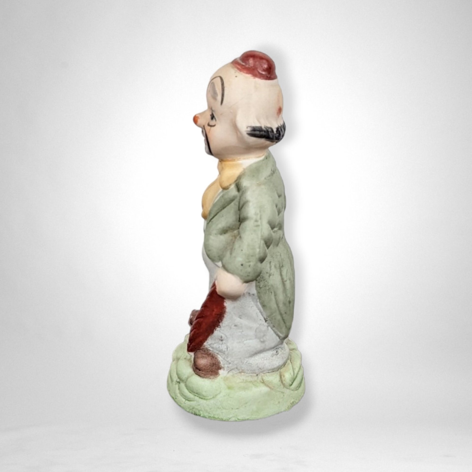 Vintage Ceramic Hobo Clown Figurine with Bat: Whimsical Collectible