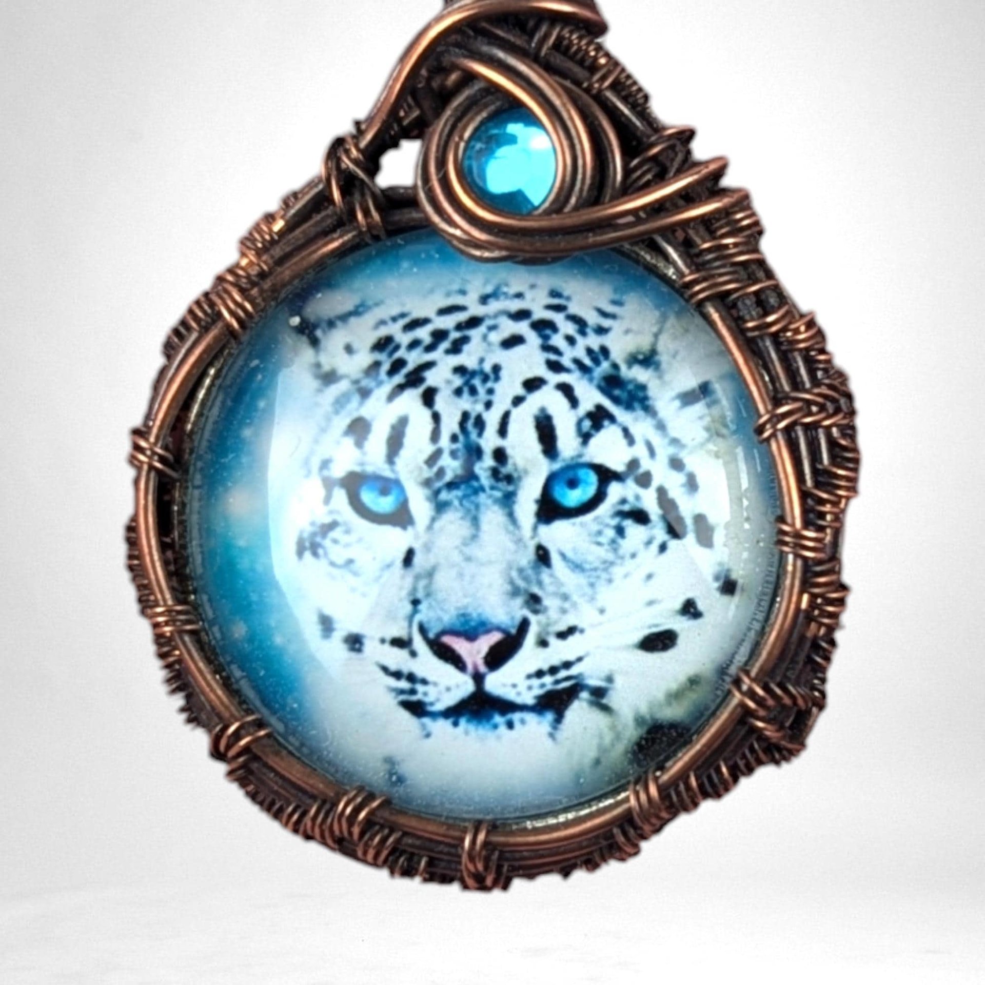 Handmade Snow Leopard Pendant | Copper Wire Wrapped | Blue Accent | Nature Inspired Jewelry