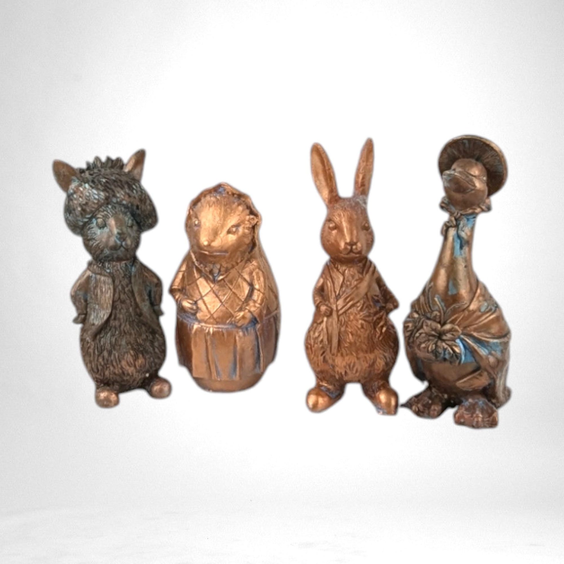Vintage Resin Beatrix Potter Figurines | Benjamin Bunny, Mrs. Tiggy Winkle, Jemima Puddle Duck, Peter Rabbit | Metal-Colored Collectible Set