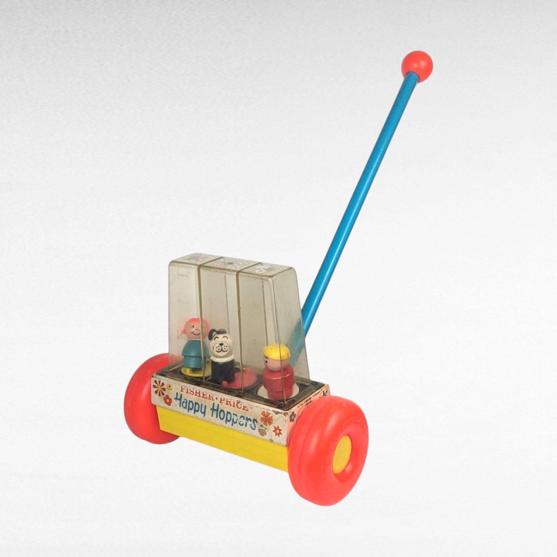 1969 Fisher Price Happy Hoppers Push Toy.