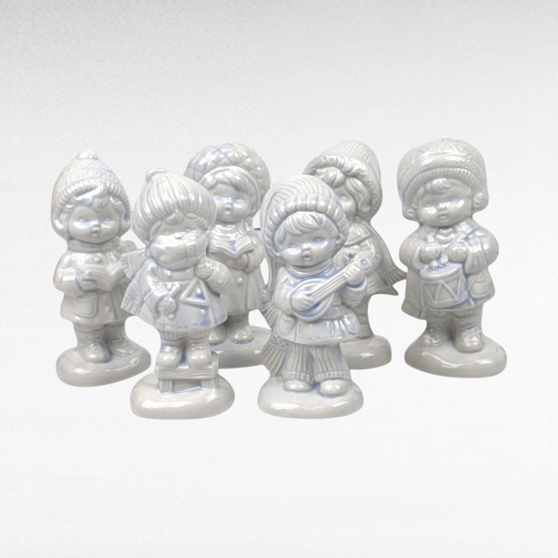Set of 6 Ceramic Hand Painted Caroler Figurines.