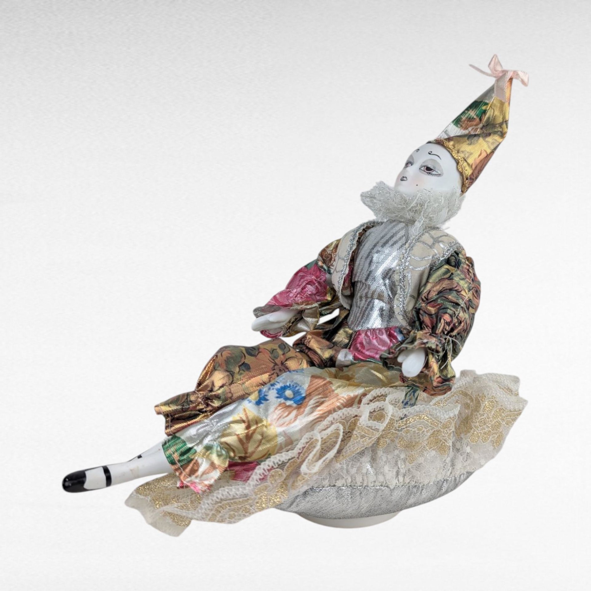 Vintage Porcelain Musical Harlequin Clown Doll, 10 Inch Seated Jester Figurine with Wind-Up Music Box, Collectible Circus Themed Decor Gift