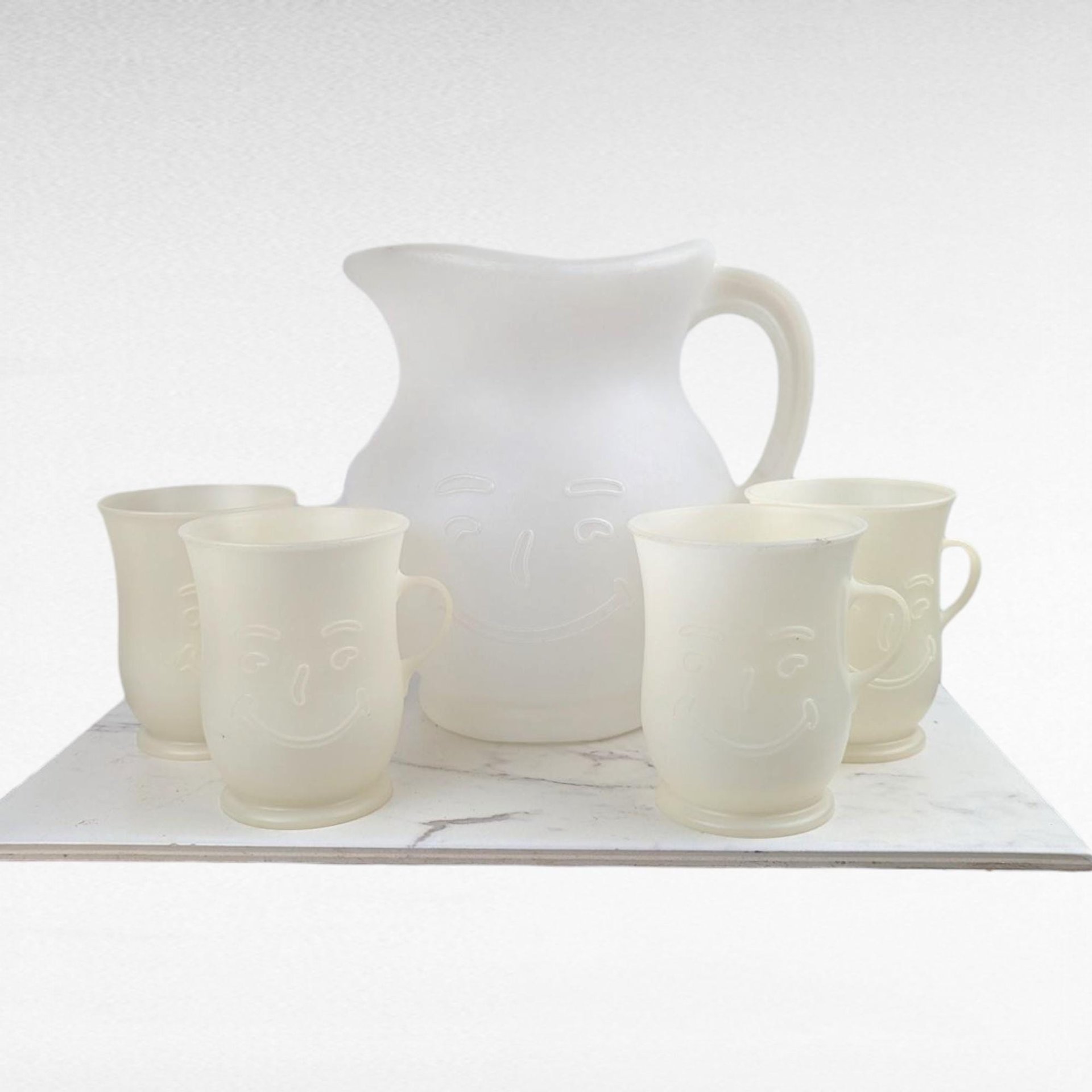 Vintage Kool-Aid Man Pitcher Set, 4 Matching Mugs, Wacky White Plastic Drinkware, 1980s Kitchen Nostalgia