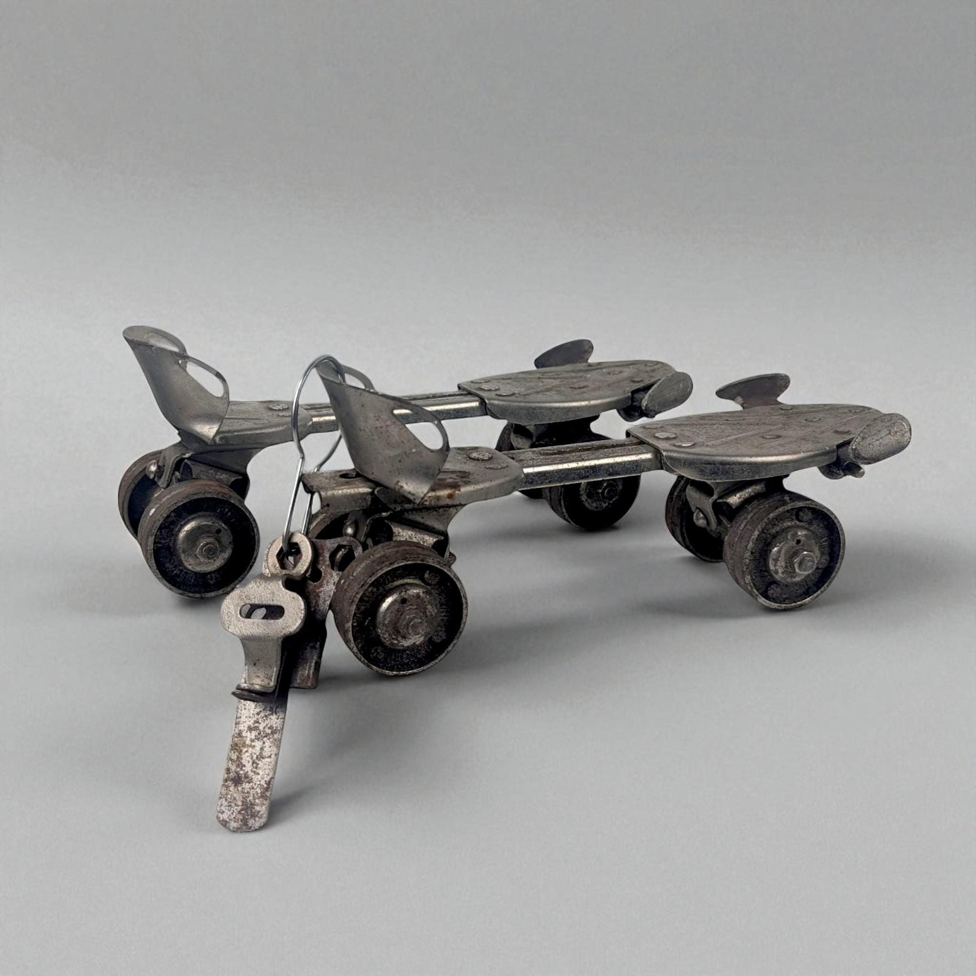 Vintage Metal Roller Skates with Key, Adjustable Sidewalk Skates with Deadnaught Wheels, Mid-Century Industrial Decor and Photo Prop