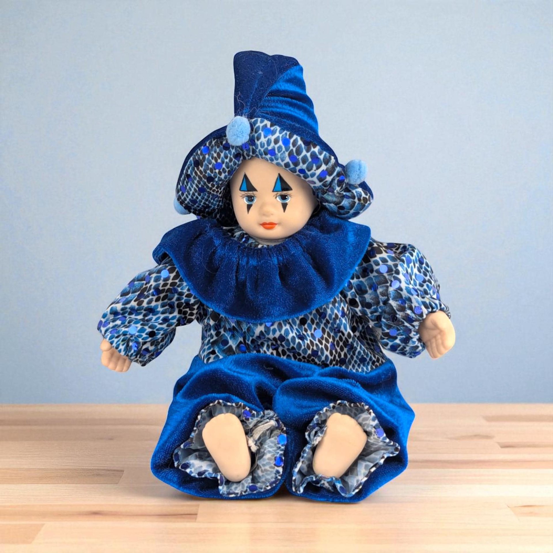Vintage Blue Harlequin Doll: Porcelain Clown Baby Figurine, Whimsical Home Decor