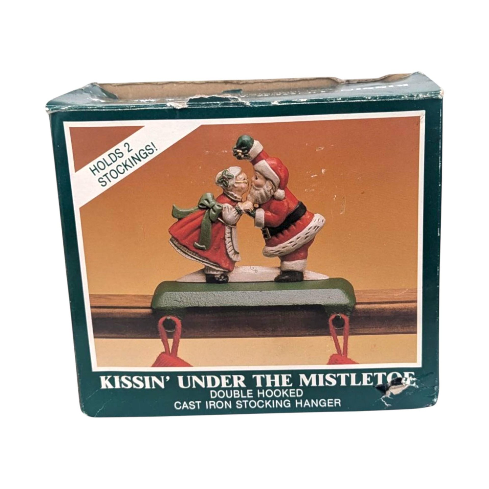 Vintage Kissing Santa Stocking Holder: Cast Iron Christmas Mantle Hanger