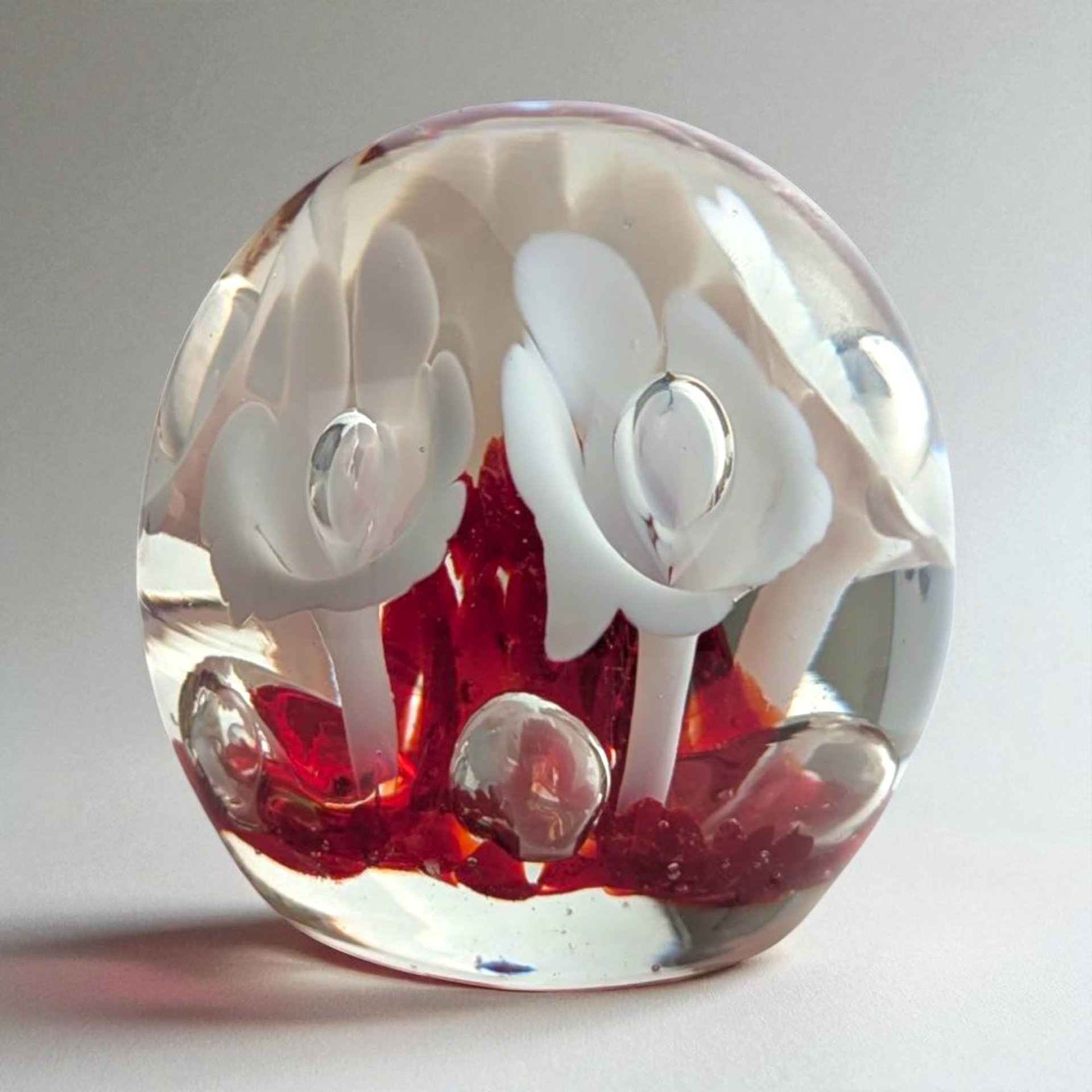 Vintage Art Glass Paperweight: Red Base, White Flower Design