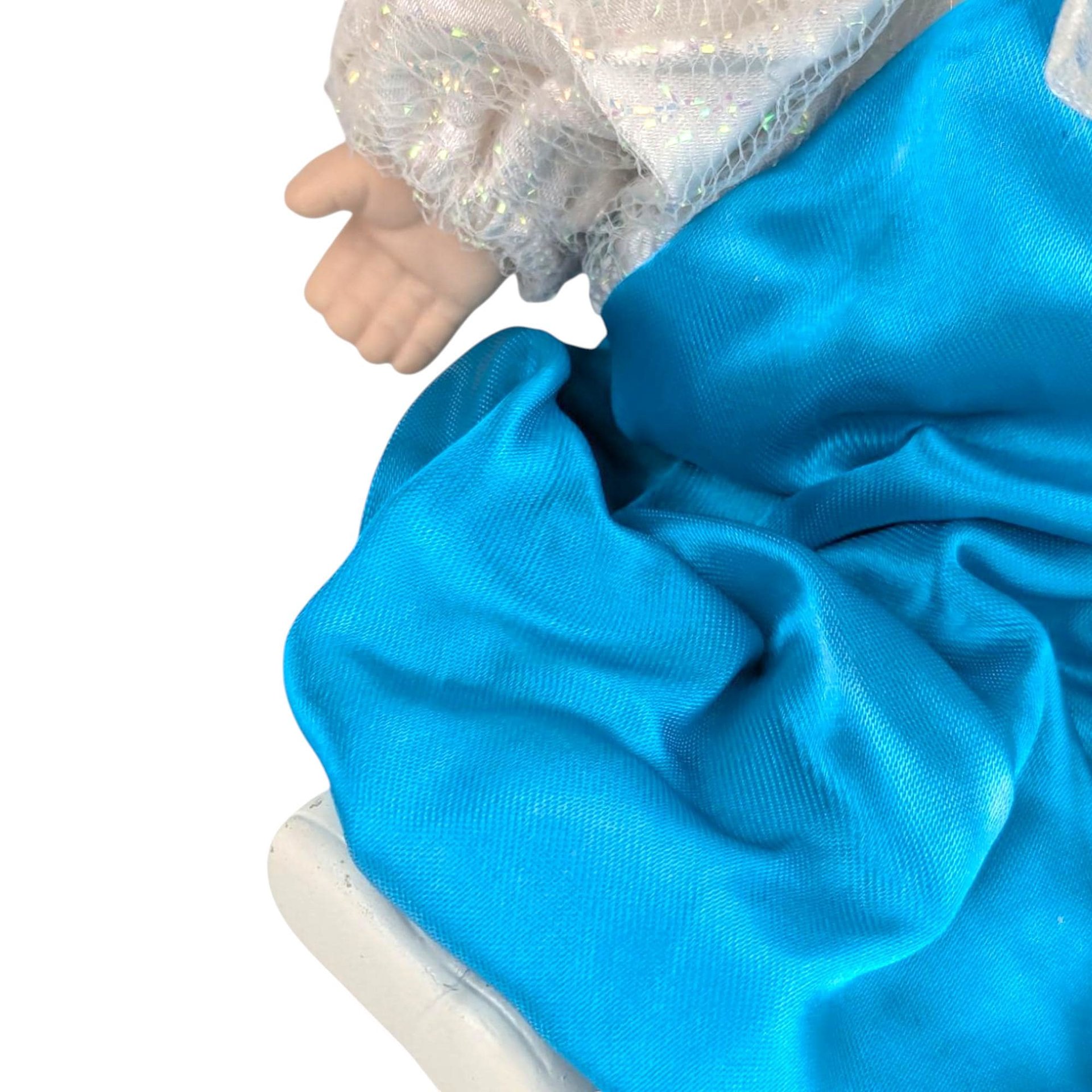 Vintage Porcelain Jester Doll: Blue & White Clown Figurine