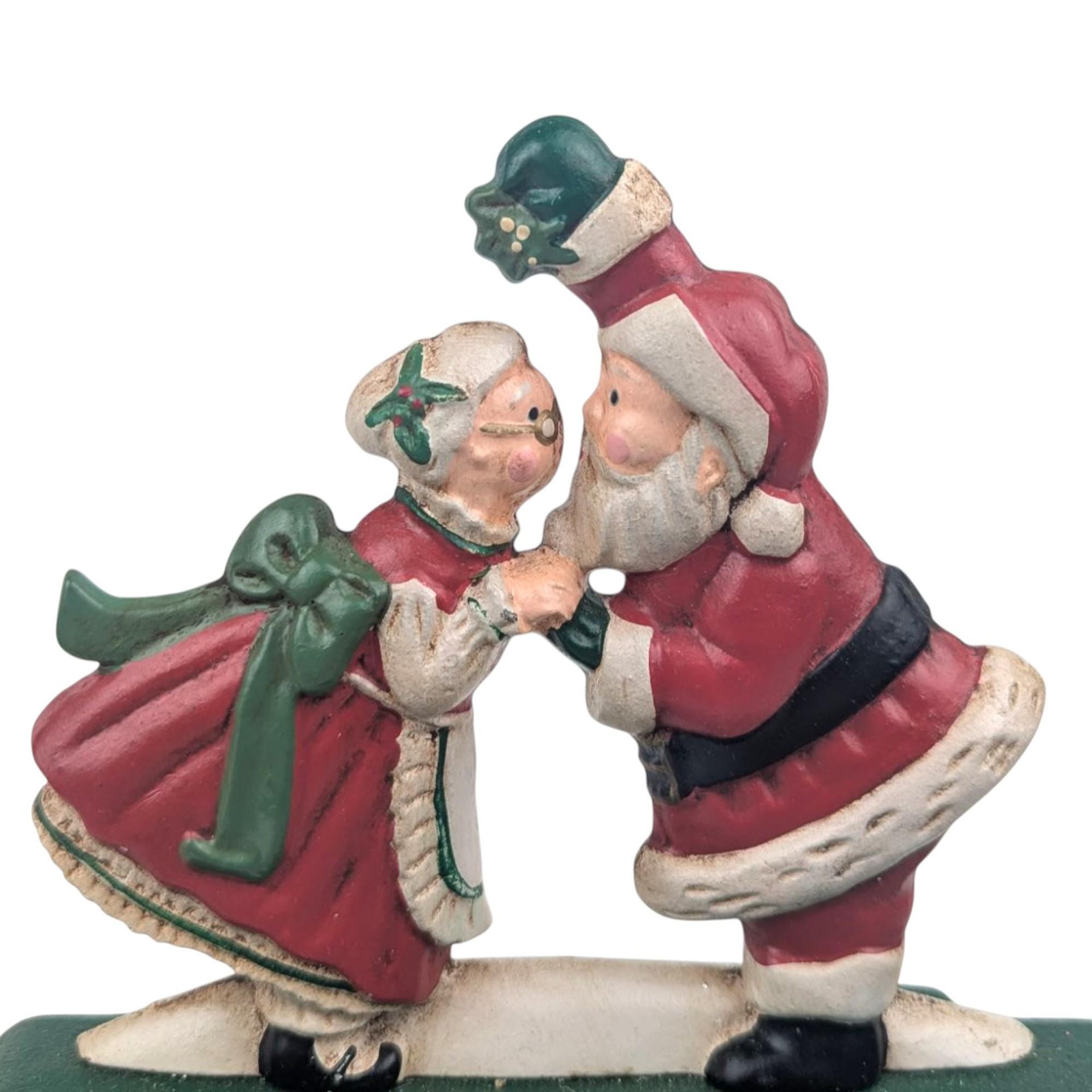 Vintage Kissing Santa Stocking Holder: Cast Iron Christmas Mantle Hanger