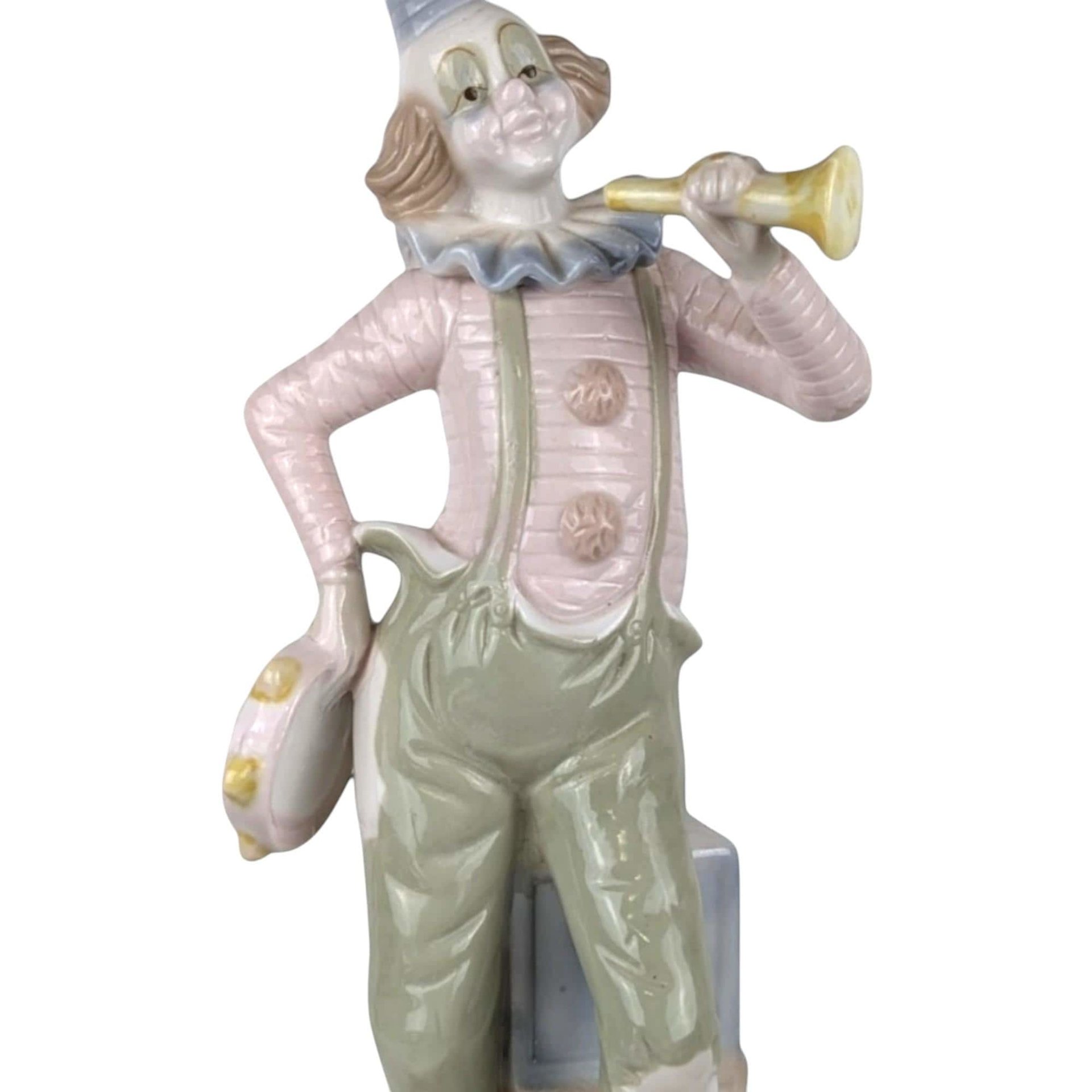 Vintage Porcelain Clown with Horn and Tambourine