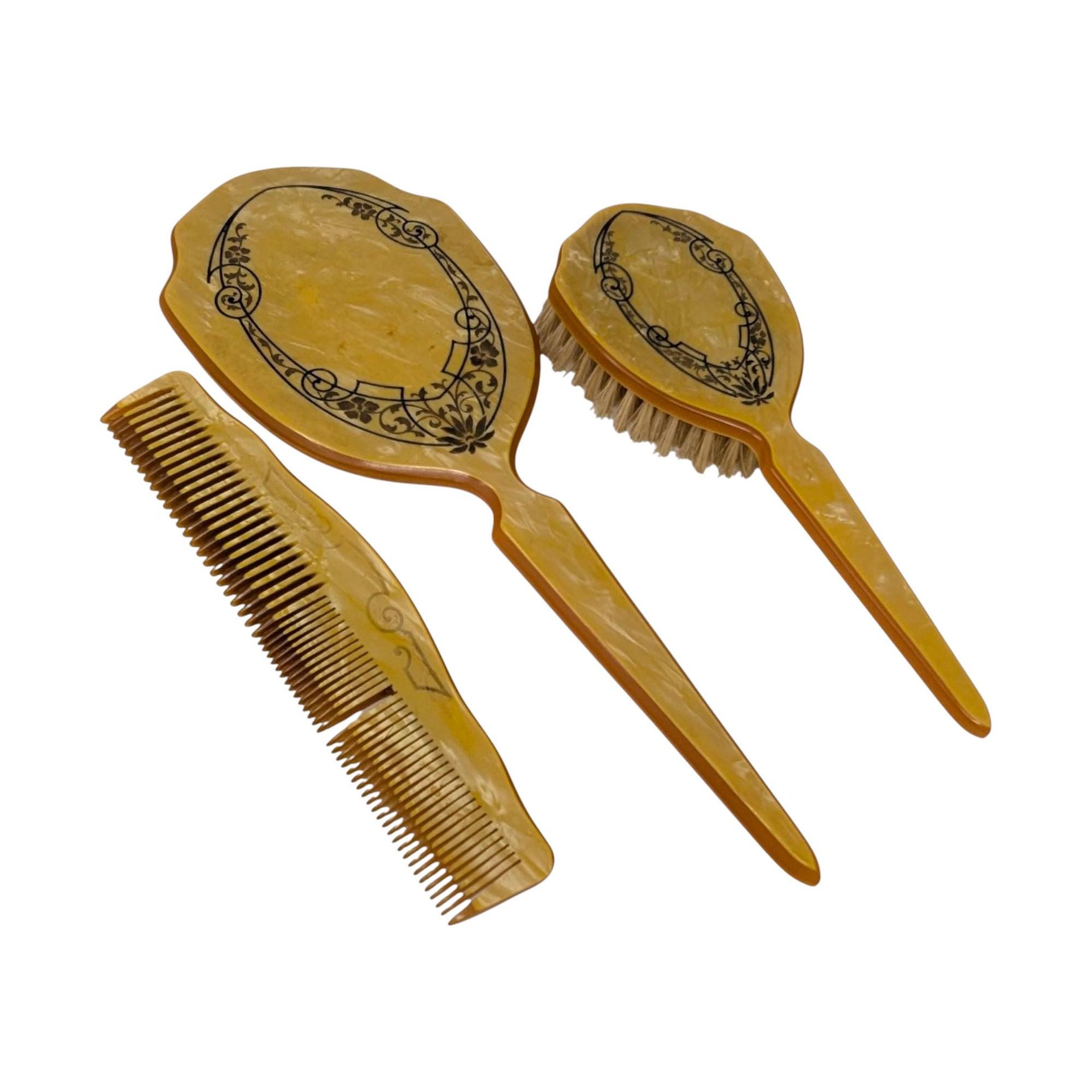Vintage Three-Piece Amber Celluloid Vanity Set