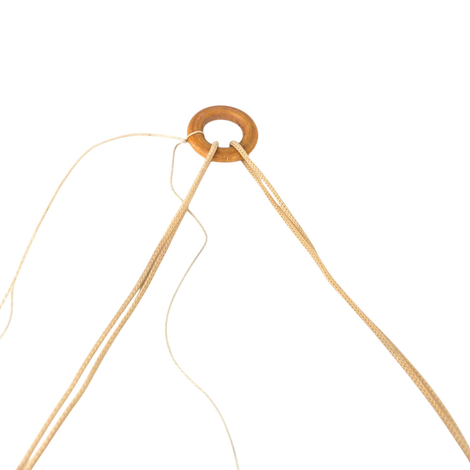 Vintage Green and Gold Porcelain Swinging Clown Doll