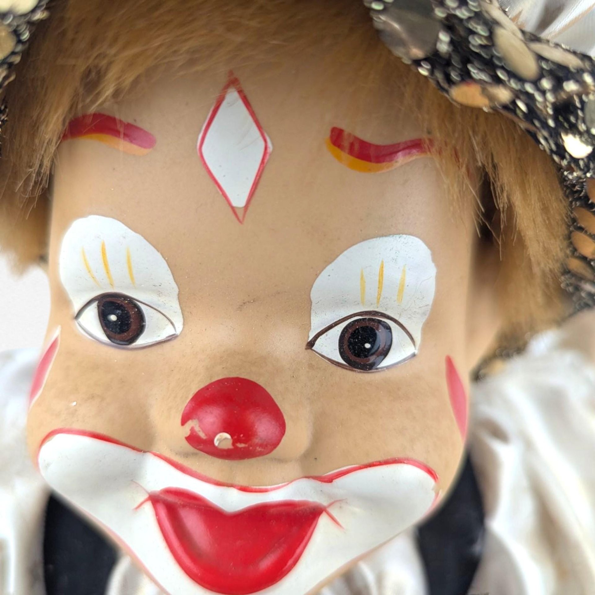 Vintage Green and Gold Porcelain Swinging Clown Doll