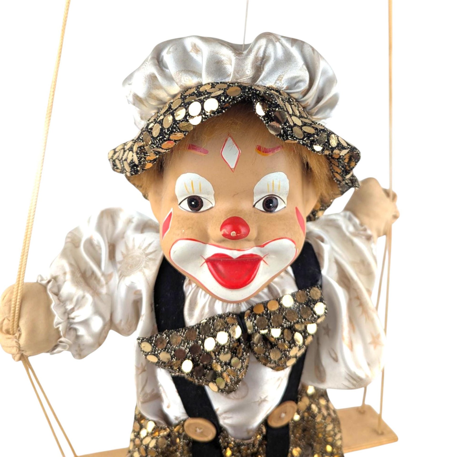 Vintage Green and Gold Porcelain Swinging Clown Doll