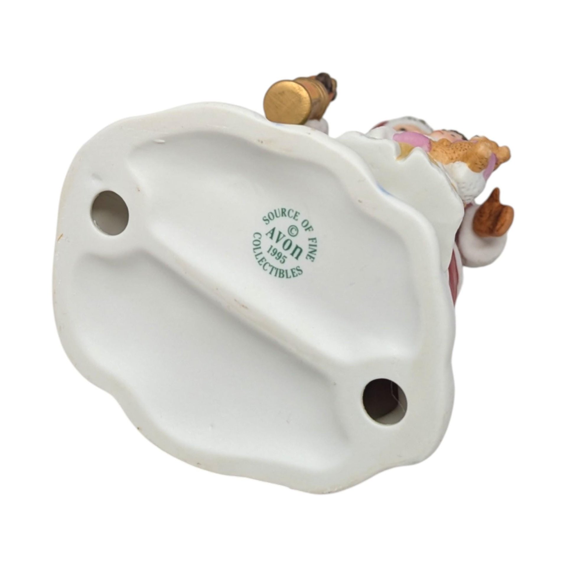 1995 Avon Santa With Child Porcelain Figurine