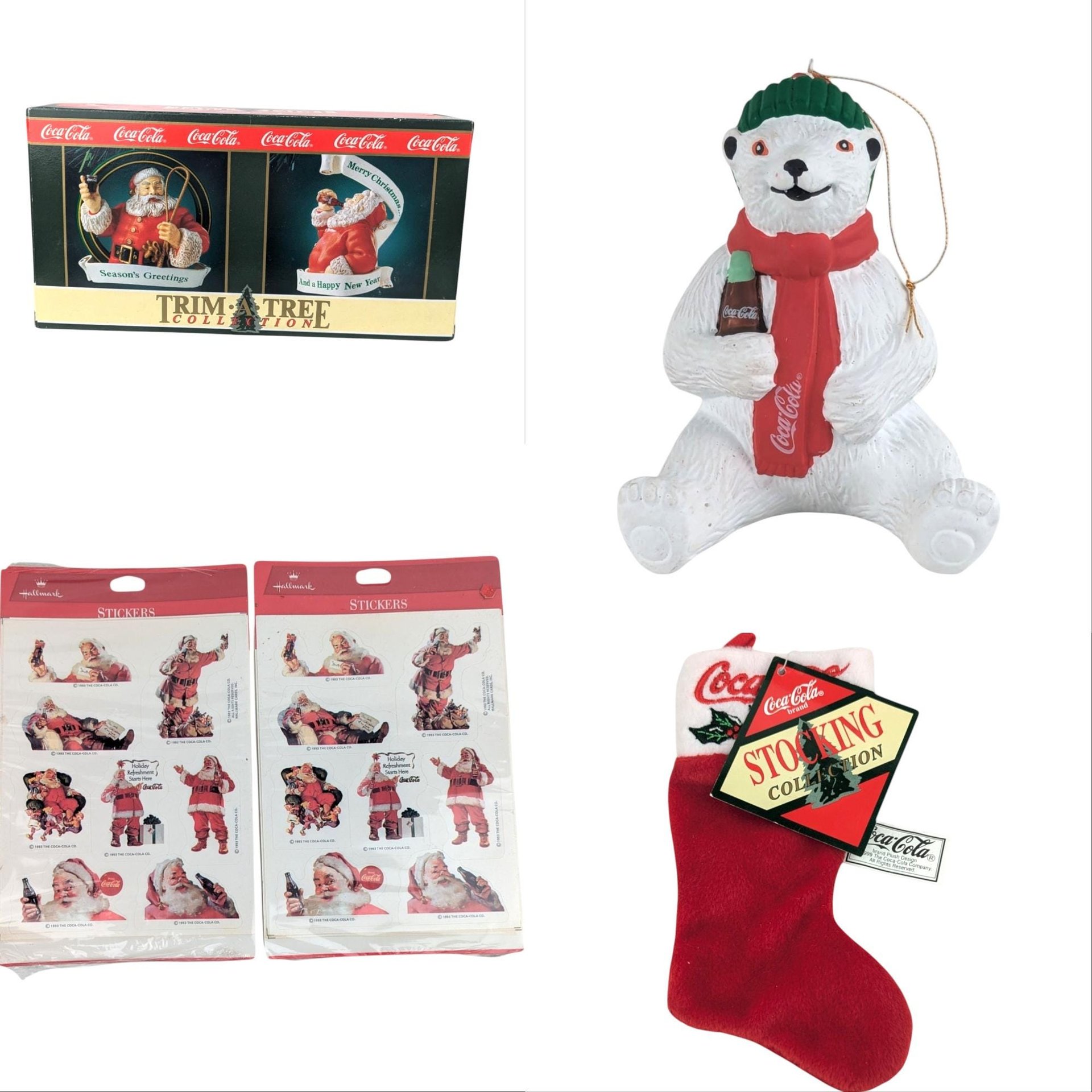 A collection of vintage Coca-Cola Christmas memorabilia including a small plush stocking, polar bear ornament, Santa stickers, and boxed figurine set.