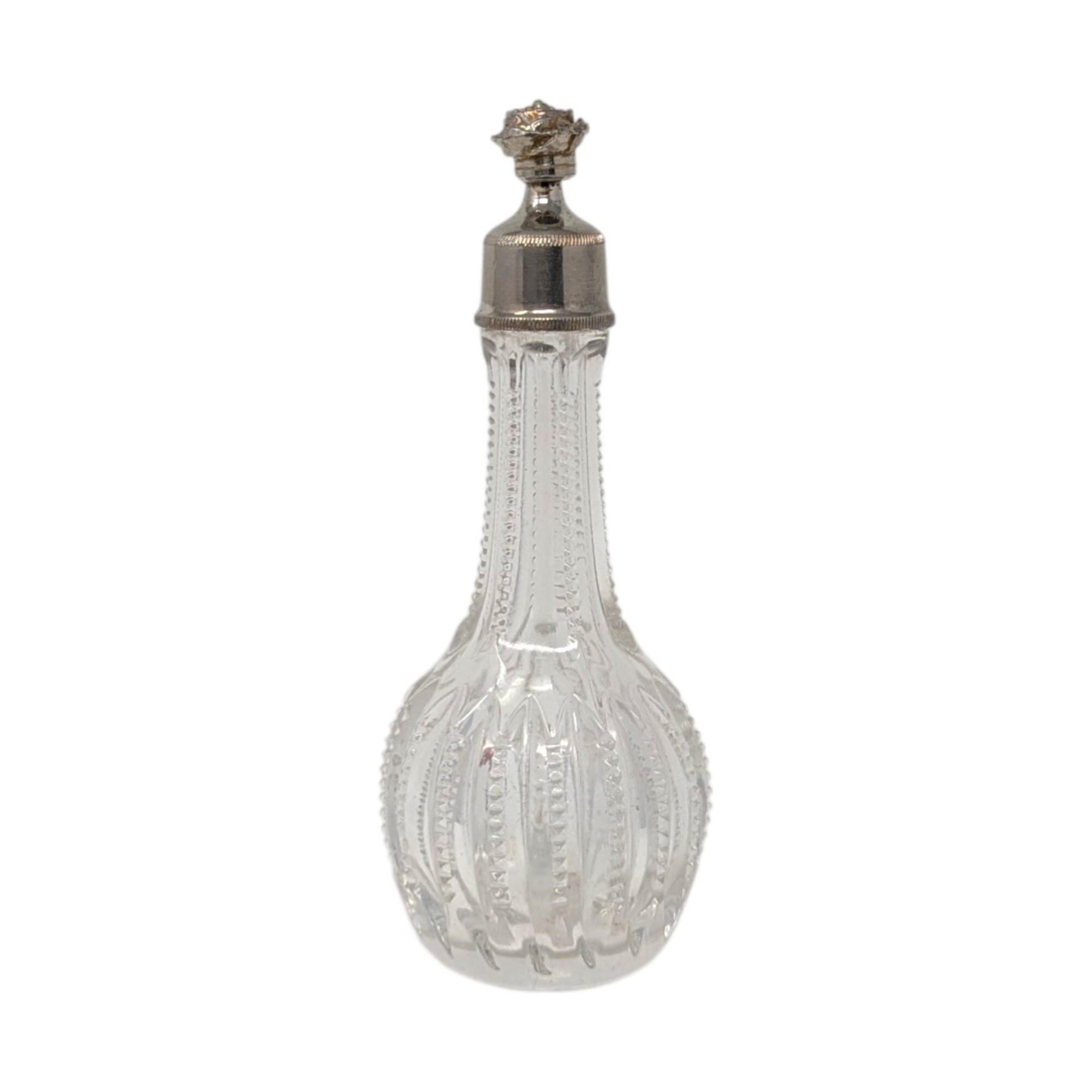 Antique Ribbed Glass Perfume Bottle with Floral Silver Tone Cap