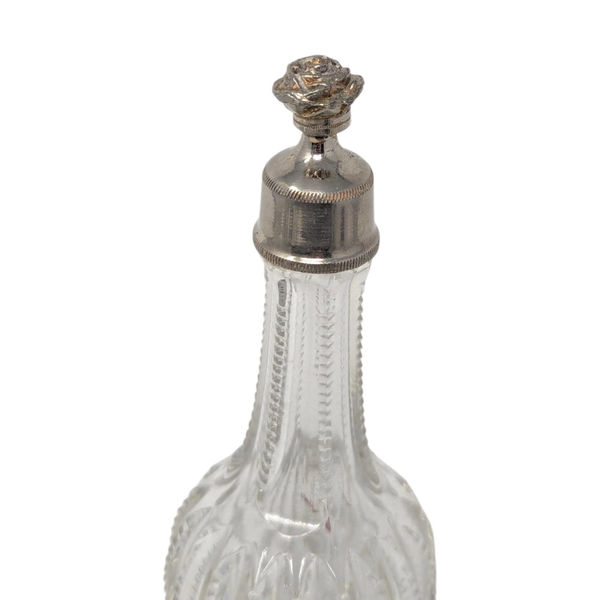 Antique Ribbed Glass Perfume Bottle with Floral Silver Tone Cap